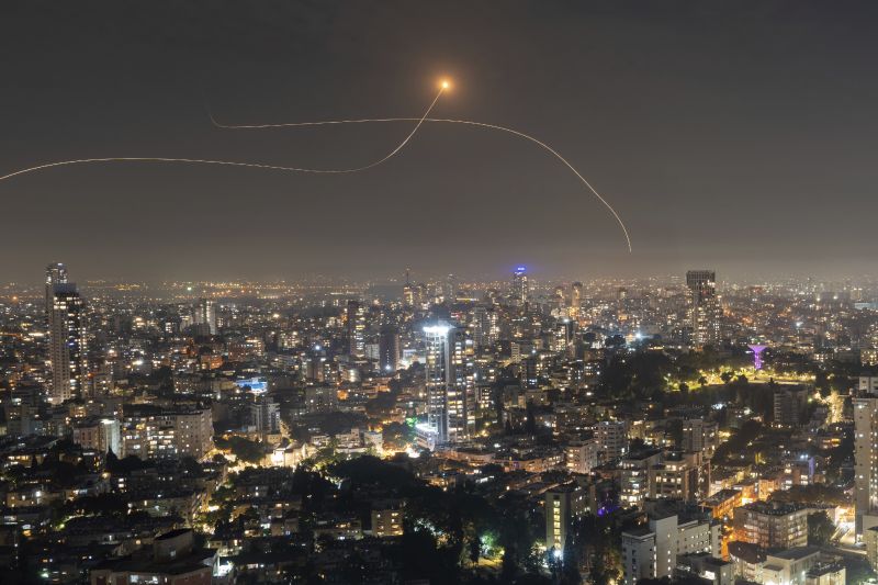 Israeli Iron Dome air defense system fires to intercept a rocket fired from the Gaza Strip, in central Israel, Saturday.