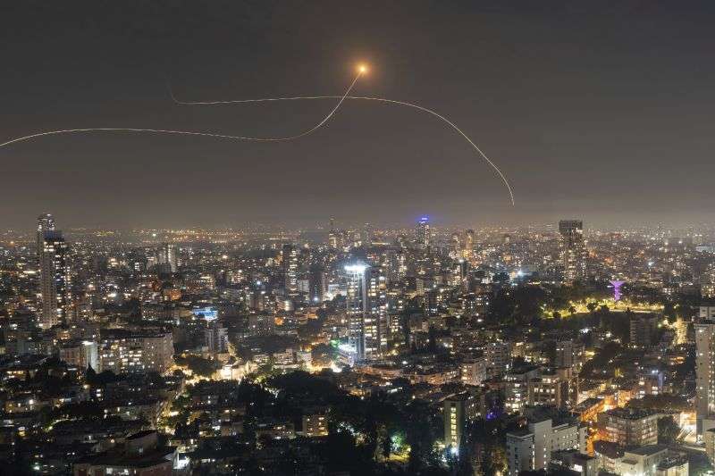 Israeli Iron Dome air defense system fires to intercept a rocket fired from the Gaza Strip, in central Israel, Saturday.