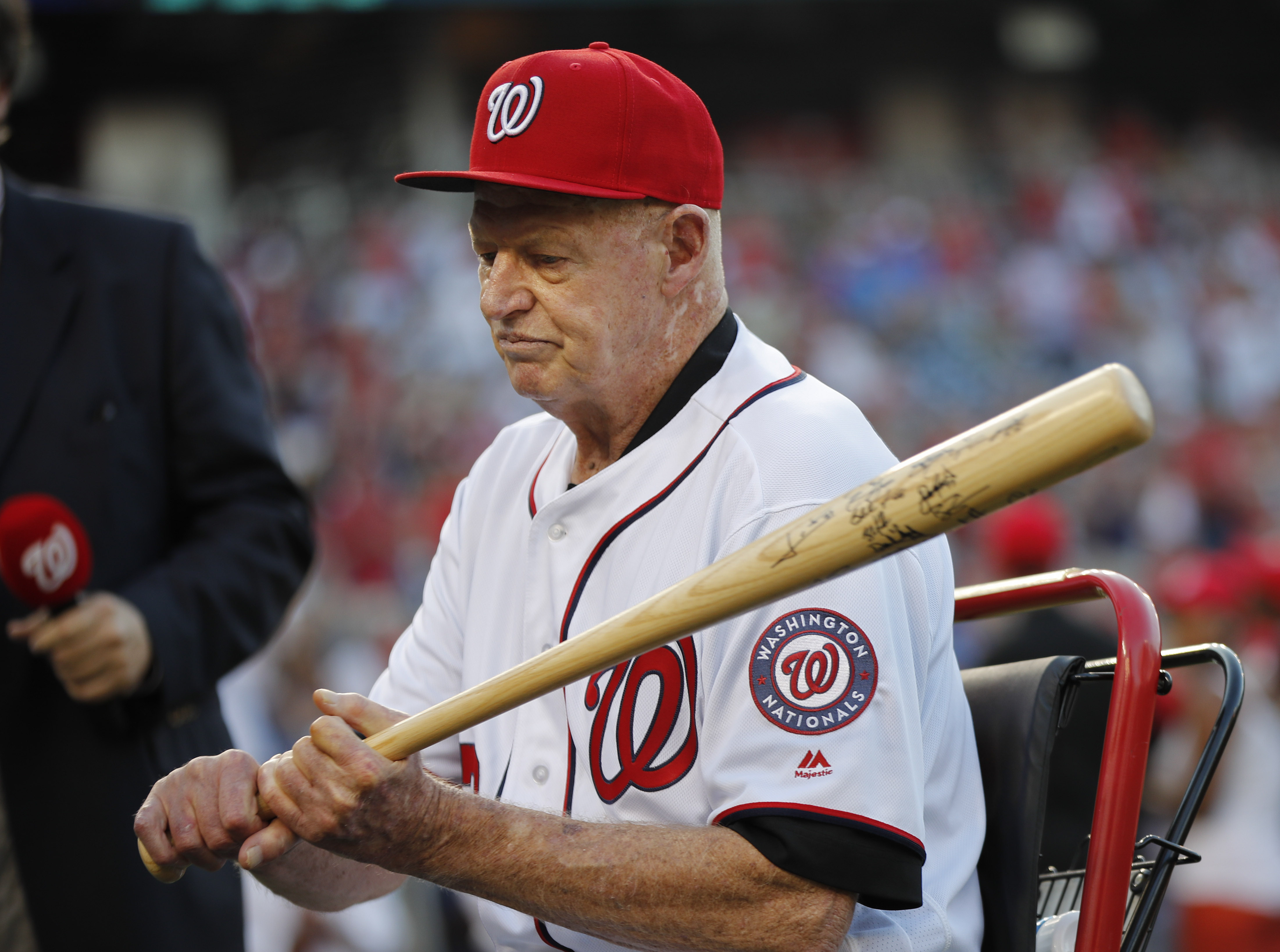 FILE - Former Washington Senators player Frank Howard grips a baseball bat during a pregame ceremony at Nationals Park, Aug. 26, 2016, in Washington. Former major leaguer Howard has died at the age of 87. A spokesperson for the Washington Nationals confirmed the team was informed of Howard's death Monday, Oct. 30, 2023, by his family. 