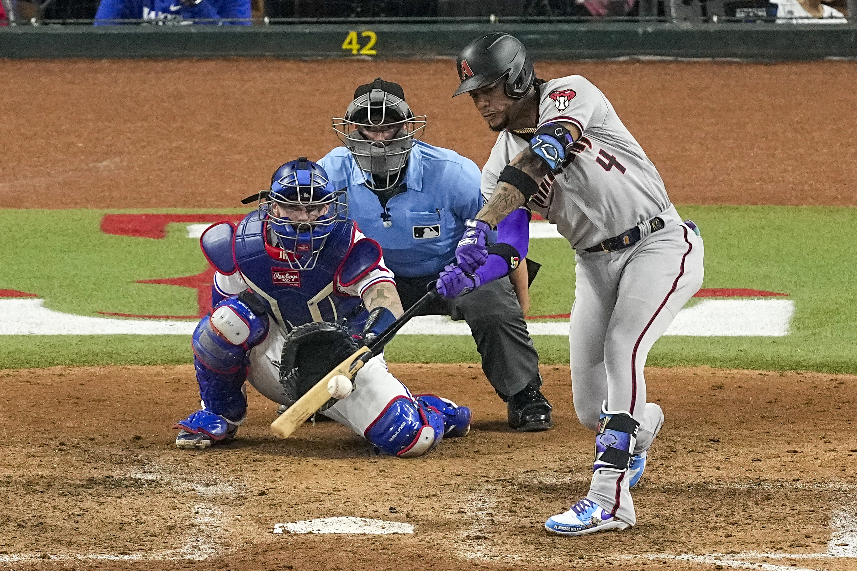 Arizona Diamondbacks' Ketel Marte hits a two-run single against the Texas Rangers during the eighth inning in Game 2 of the baseball World Series Saturday, Oct. 28, 2023, in Arlington, Texas. 