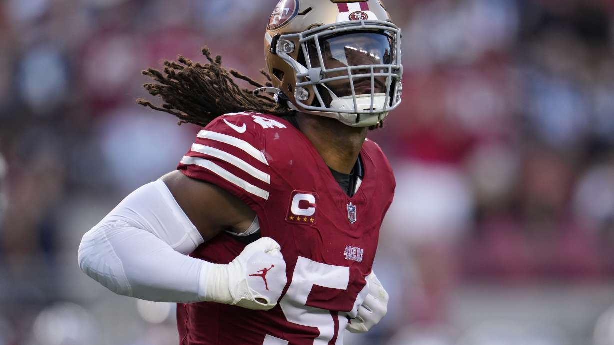 FILE -San Francisco 49ers linebacker Fred Warner (54) celebrates after sacking Dallas Cowboys quarterback Dak Prescott during the first half of an NFL football game in Santa Clara, Calif., Sunday, Oct. 8, 2023. Warner is in the same spot as he was to start the season. He's the clear-cut choice as the top off-ball linebacker in the NFL.