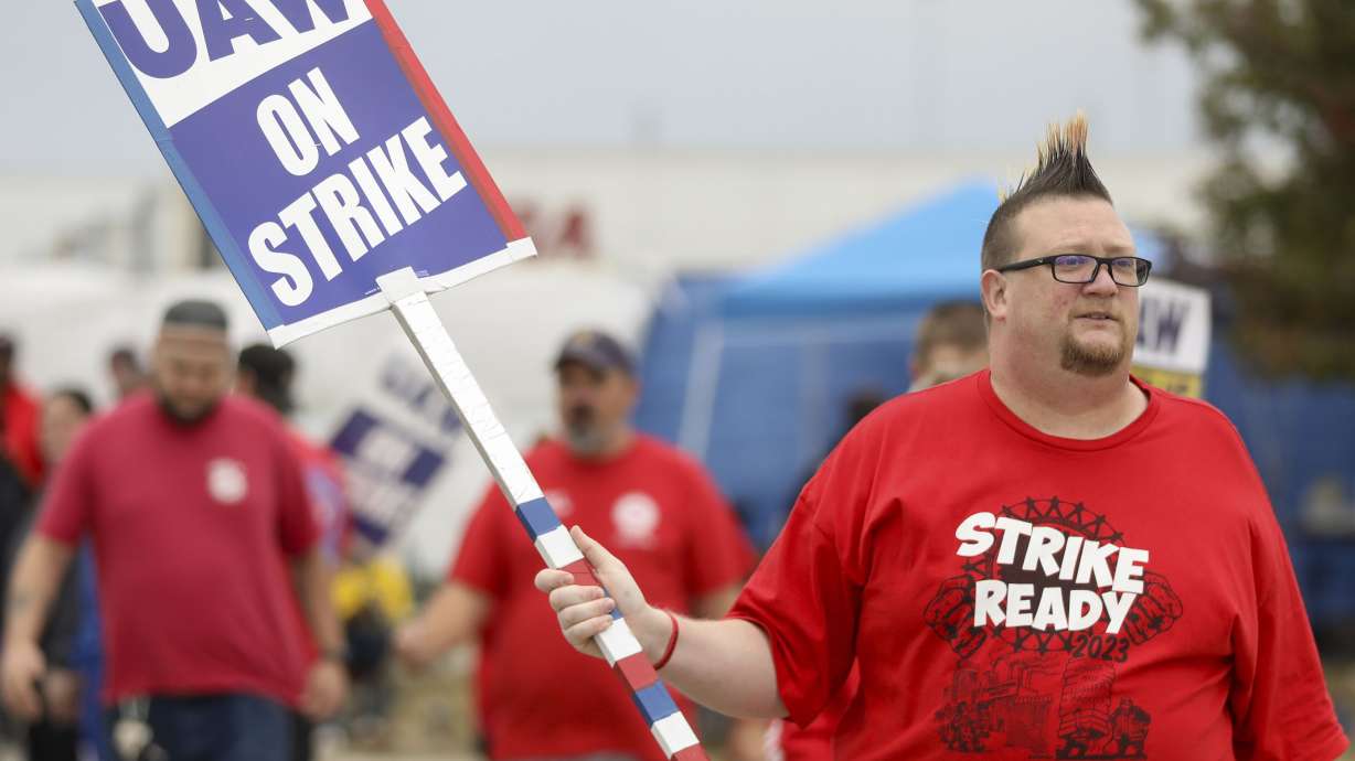 Brian “Rooster” Heppner, a United Auto Workers Local 12 member, pickets during the ongoing UAW strike at the Stellantis Toledo Assembly Complex on Wednesday, in Toledo, Ohio.