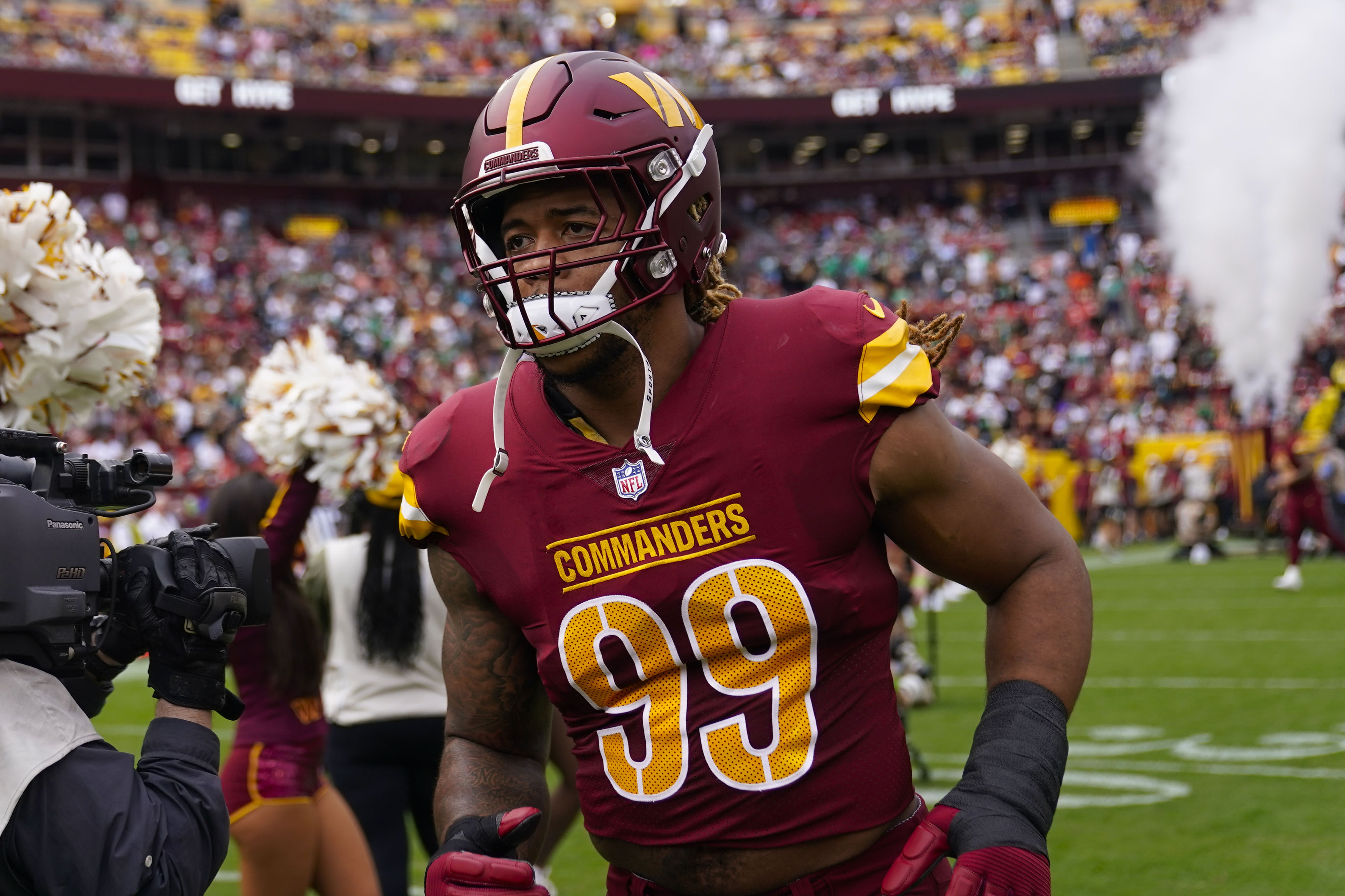 Washington Commanders defensive end Chase Young (99) taking the field before the start of the first half of an NFL football game against the Philadelphia Eagles, Sunday, Oct. 29, 2023, in Landover, Md. 