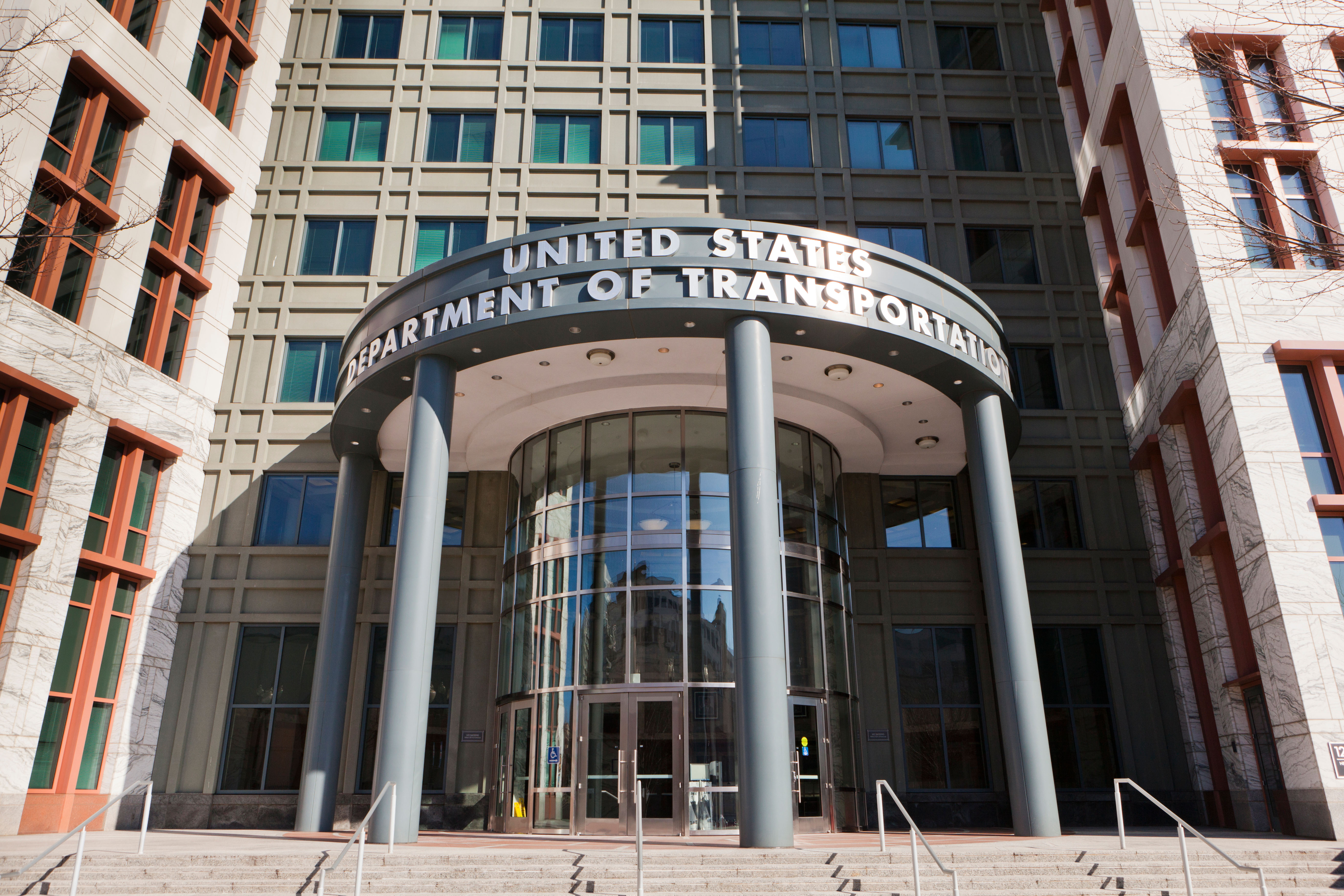 Authorities say a co-pilot threatened to shoot the captain if the plane was diverted to take care of a passenger who needed medical attention.