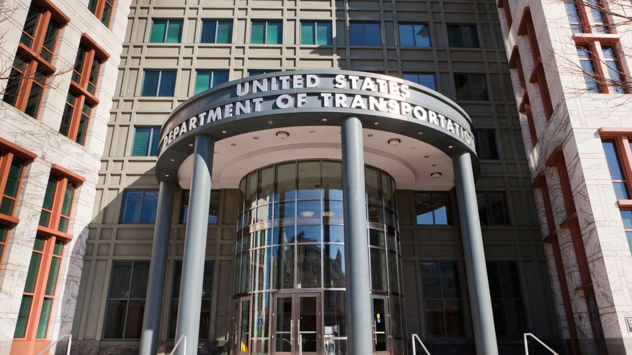 Authorities say a co-pilot threatened to shoot the captain if the plane was diverted to take care of a passenger who needed medical attention.