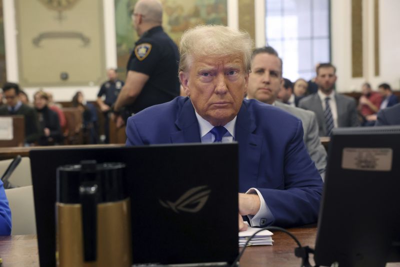 Former President Donald Trump waits for the continuation of his civil business fraud trial at New York Supreme Court, Wednesday in New York.