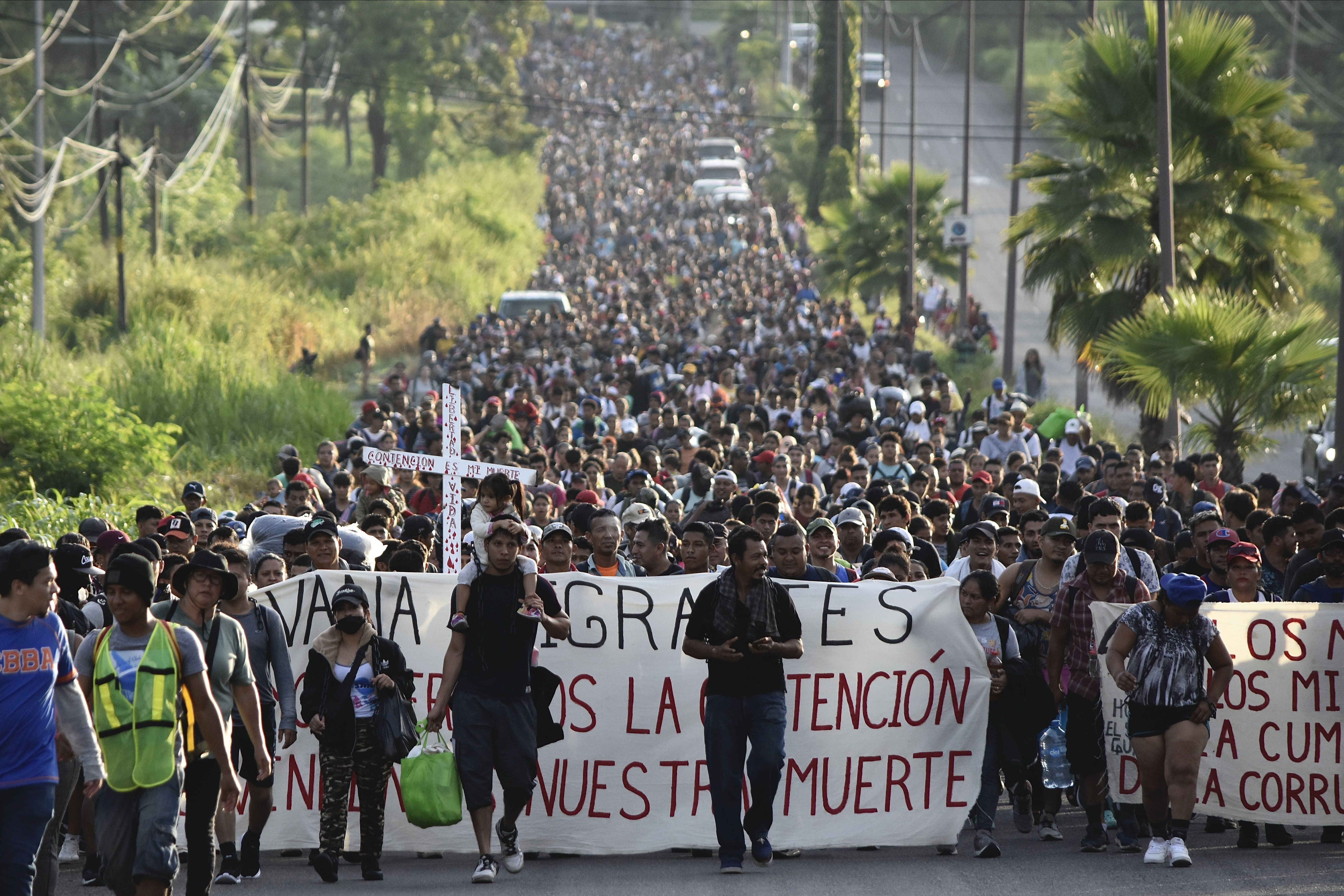 Migrants who had been waiting for temporary transit papers but failed to get them after waiting, some up to two months, leave Tapachula, Mexico, Oct. 30 as they make their way to the U.S. border. 