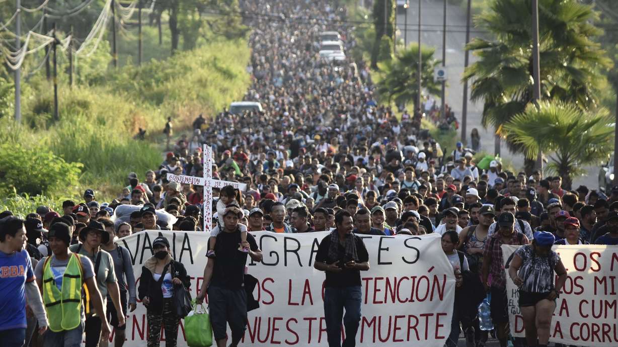 Migrants who had been waiting for temporary transit papers but failed to get them after waiting, some up to two months, leave Tapachula, Mexico, Oct. 30 as they make their way to the U.S. border.