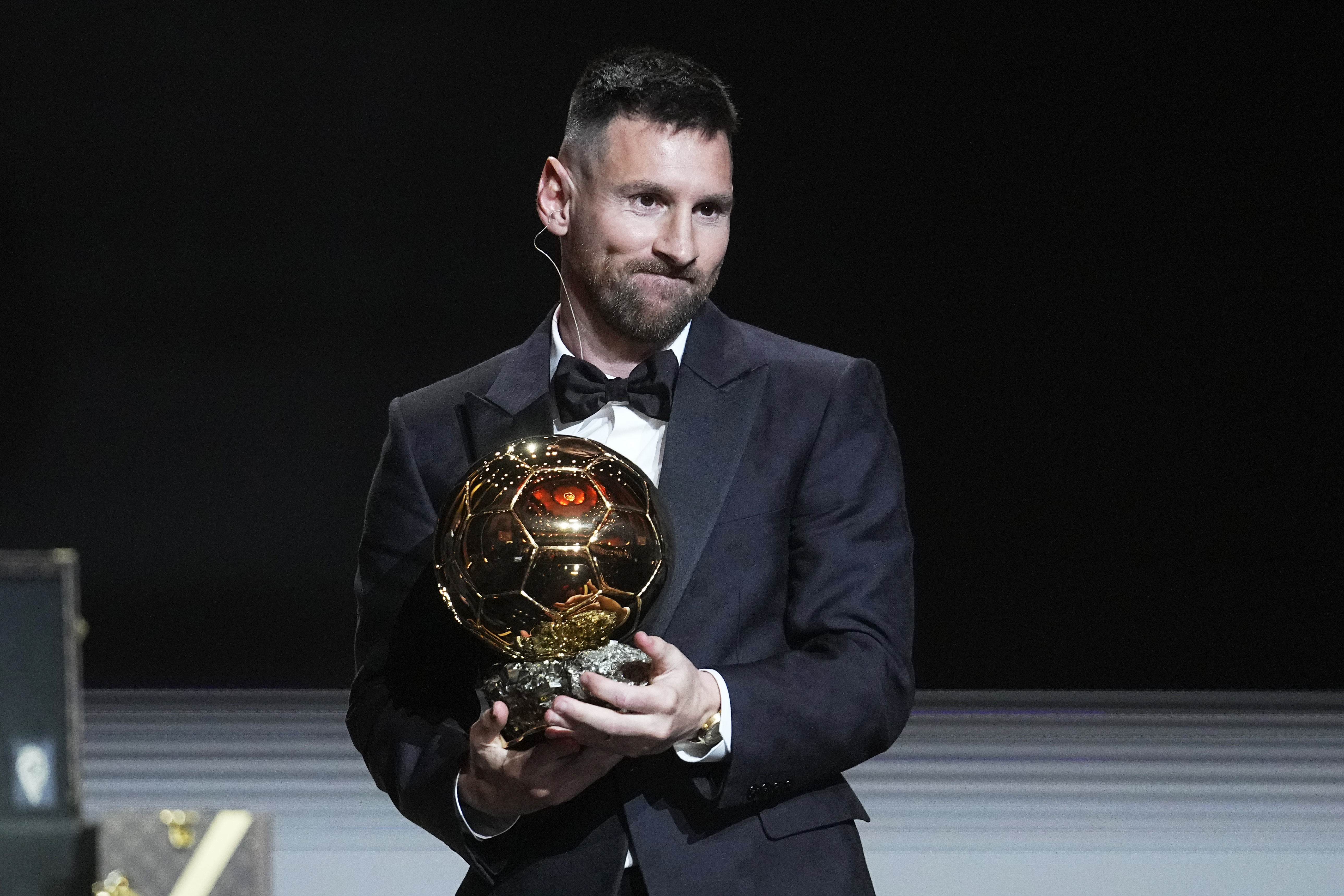 Inter Miami's and Argentina's national team player Lionel Messi receives the 2023 Ballon d'Or trophy during the 67th Ballon d'Or (Golden Ball) award ceremony at Theatre du Chatelet in Paris, France, Monday, Oct. 30, 2023. 