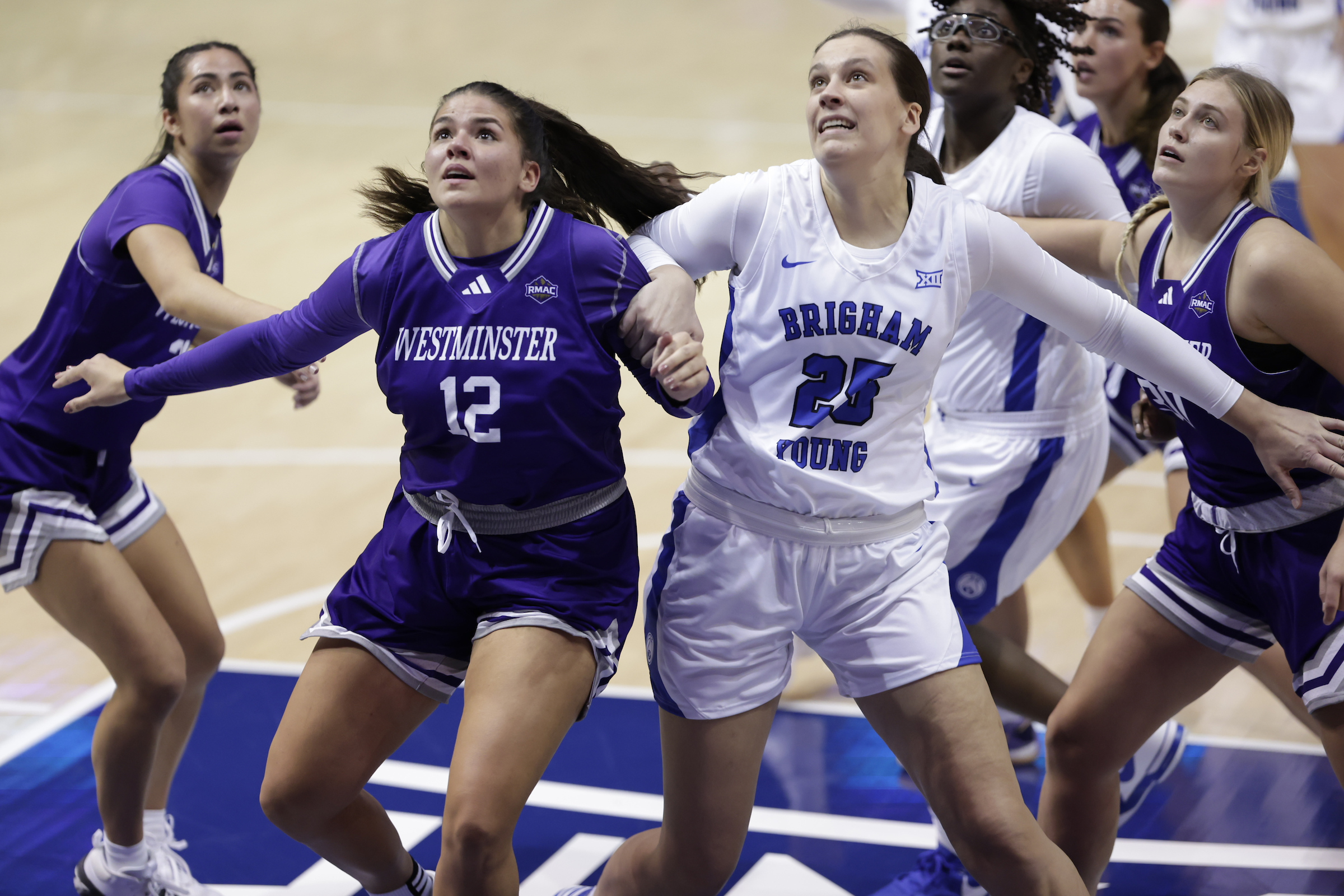 BYU forward Emma Calvert battles down low with Westminster's Maunayia Harrigfield during the Cougars' exhibition win, Wednesday, Nov. 1, 2023 at the Marriott Center in Provo.