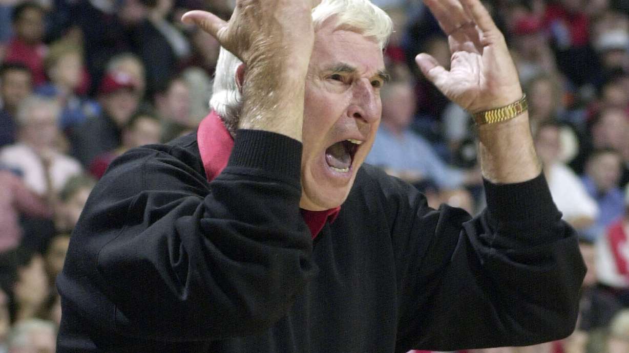 Texas Tech coach Bob Knight yells from the sidelines in the first half against Houston, Dec. 14, 2001, in Houston. Knight, the brilliant and combustible coach who won three NCAA titles at Indiana, has died.