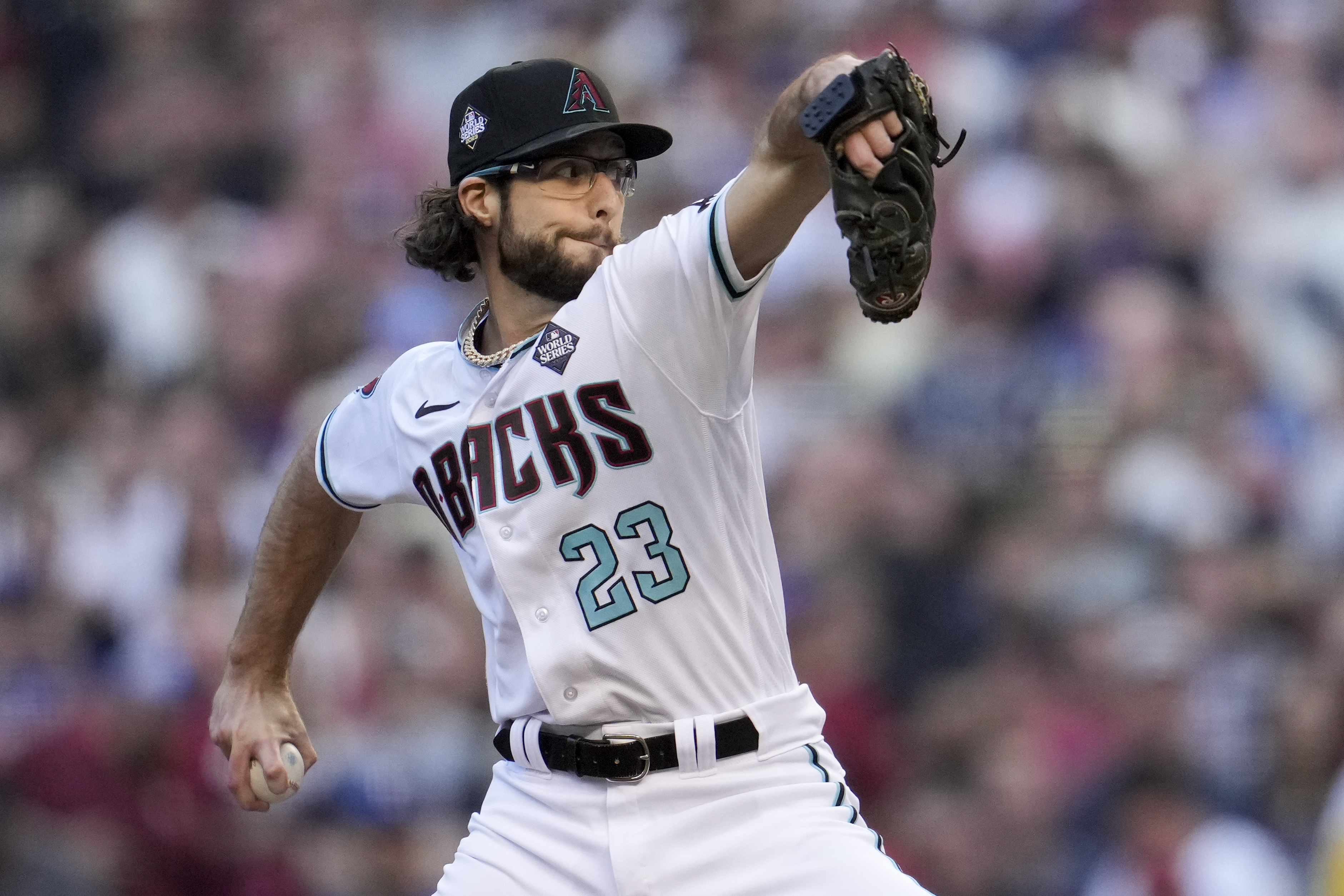 Arizona Diamondbacks starting pitcher Zac Gallen throws against the Texas Rangers during the first inning in Game 5 of the baseball World Series Wednesday, Nov. 1, 2023, in Phoenix. 