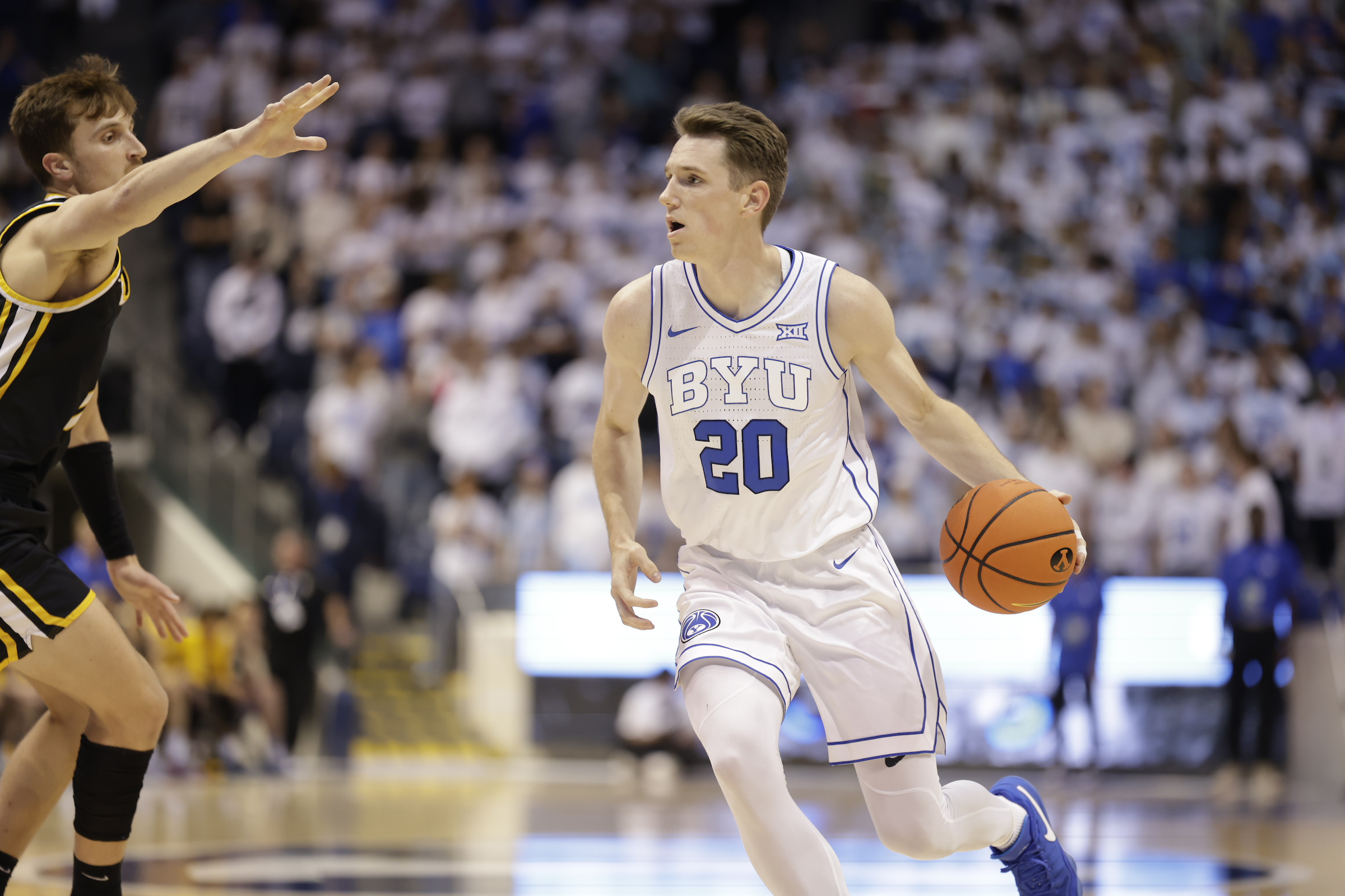 BYU wing Spencer Johnson looks to drive during an exhibition game against Life Pacific, Wednesday, Nov. 1, 2023, in the Marriott Center in Provo.