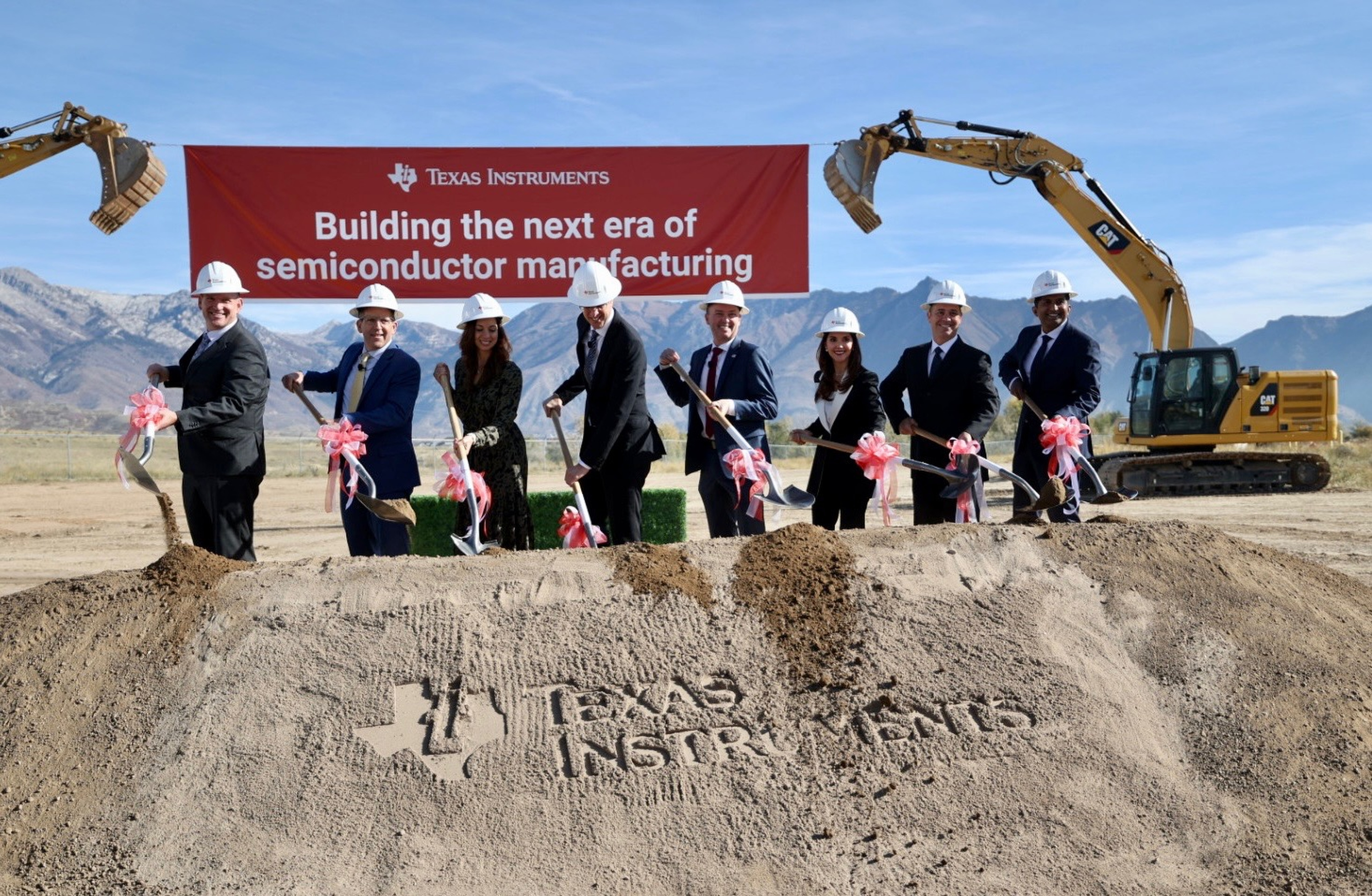 Local and state officials along with Texas Instruments officials dig in during a groundbreaking for a new factory in Lehi that will create more than 800 jobs and thousands of indirect jobs, according to Texas Instruments’ press release, on Thursday.