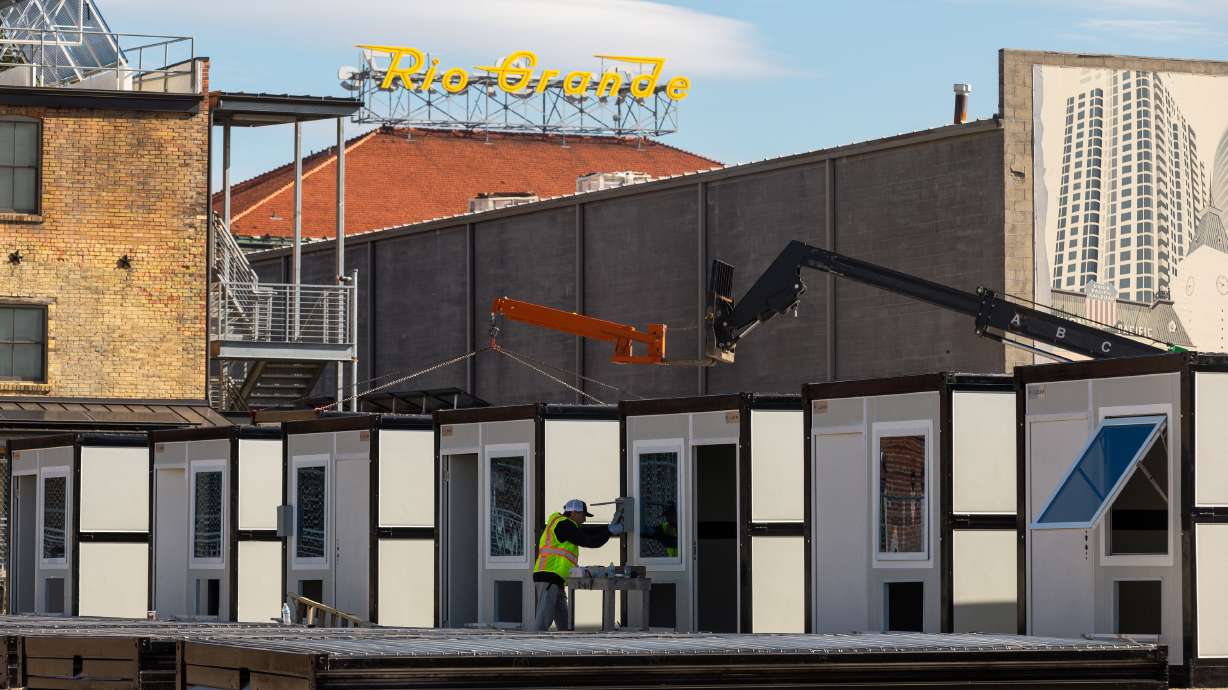 Foldum construction members work a microshelter community near 300 South and 600 West in Salt Lake City on Nov. 2, 2023.
The Salt Lake County Council approved an ordinance Tuesday for accessory dwelling units in unincorporated residential areas.