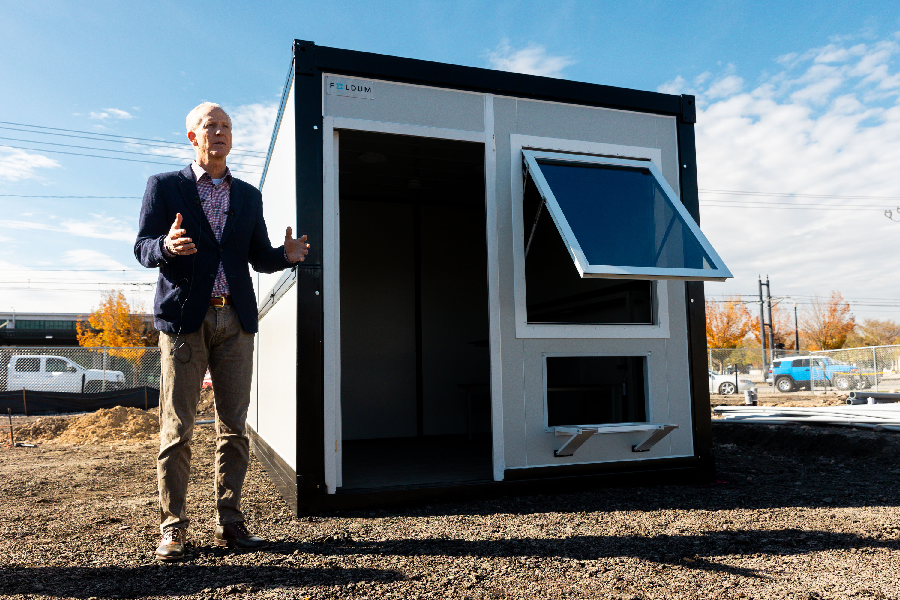 State Homeless Coordinator Wayne Niederhauser speaks about the setup of units for a microshelter community at a site near 300 South and 600 West in Salt Lake City on Thursday.