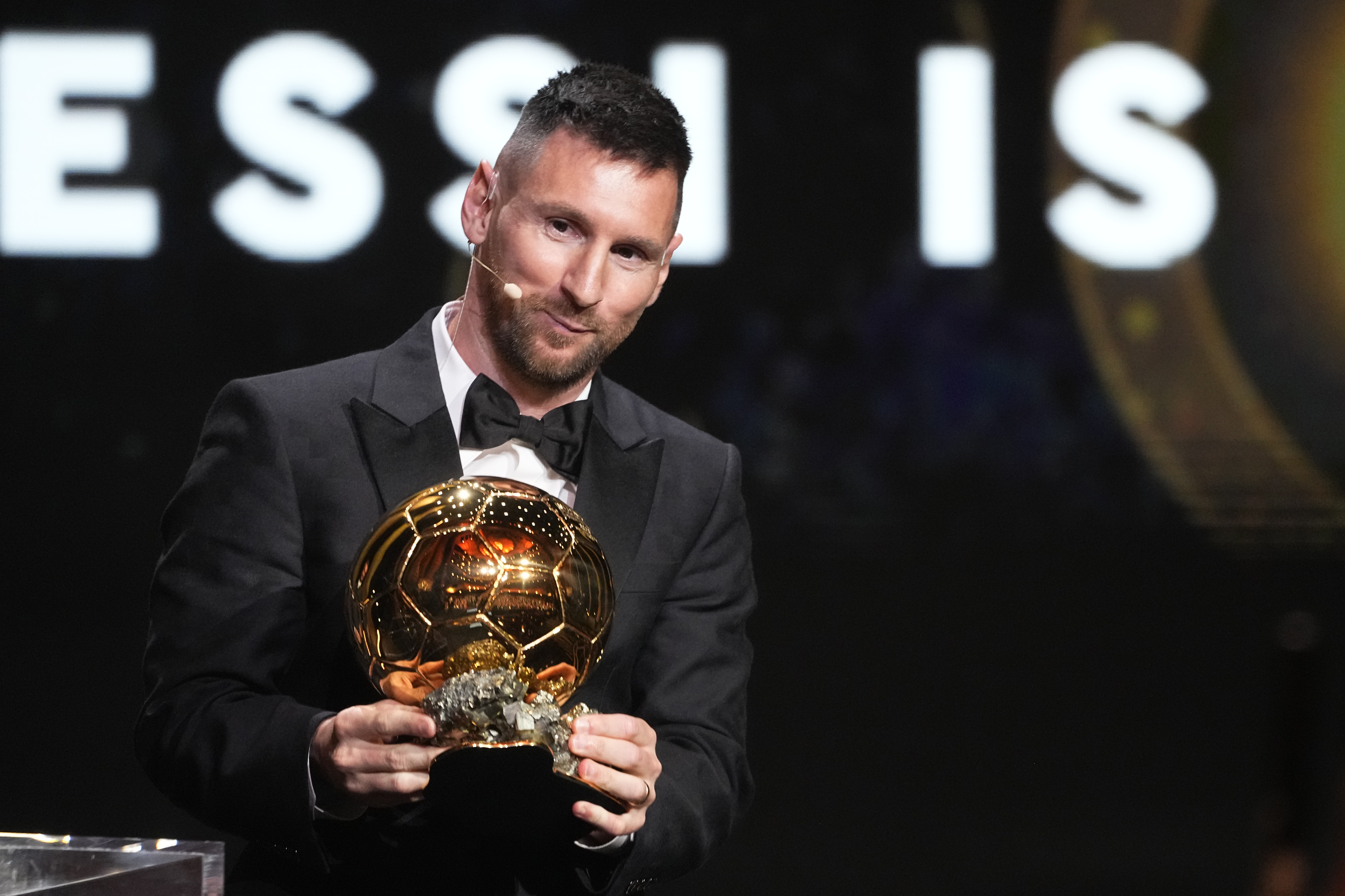 Inter Miami's and Argentina's national team player Lionel Messi receives the 2023 Ballon d'Or trophy during the 67th Ballon d'Or (Golden Ball) award ceremony at Theatre du Chatelet in Paris, France, Monday, Oct. 30, 2023. 