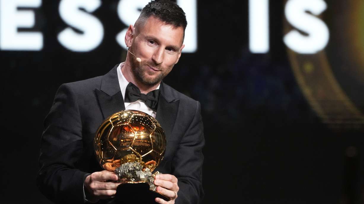 Inter Miami's and Argentina's national team player Lionel Messi receives the 2023 Ballon d'Or trophy during the 67th Ballon d'Or (Golden Ball) award ceremony at Theatre du Chatelet in Paris, France, Monday, Oct. 30, 2023.