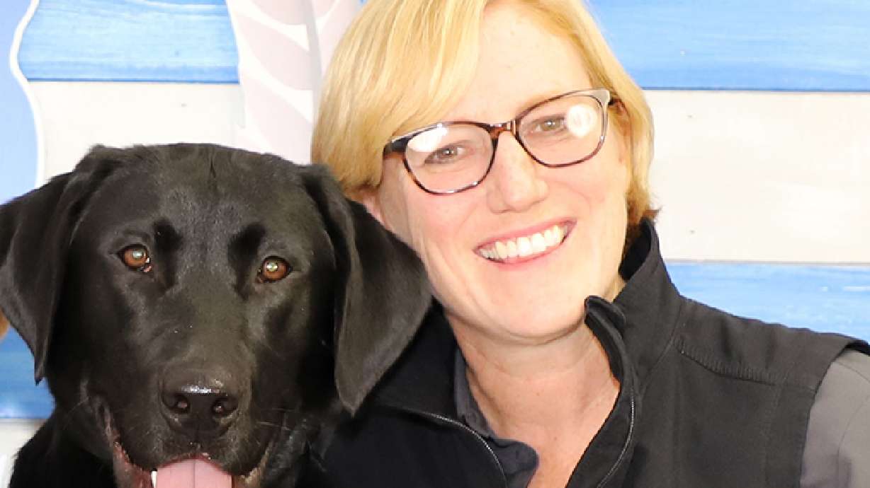 Betsy Feaster's service dog, Maynard, has helped her adjust back to civilian life after serving in the U.S. Air Force. Feaster is the CEO of Dog Training Elite, a Utah-based company that trains service dogs for free to help veterans.