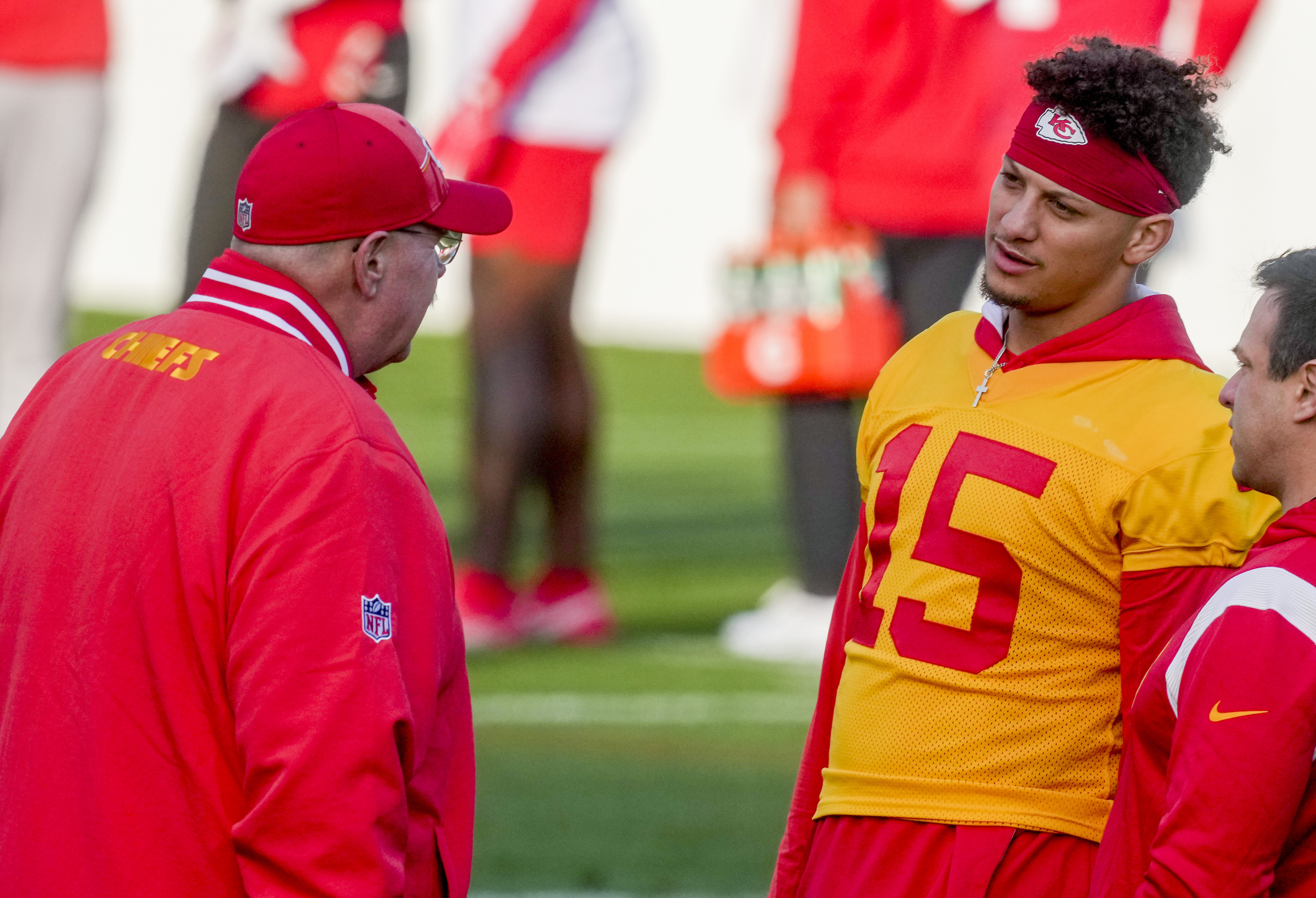 Kansas City Chiefs quarterback Patrick Mahomes (15), right, talks to Kansas City Chiefs head coach Andy Reid during a practice session in Frankfurt, Germany, Friday, Nov. 3, 2023. The Kansas City Chiefs are set to play the Miami Dolphins in a NFL game in Frankfurt on Sunday Nov. 5, 2023. 
