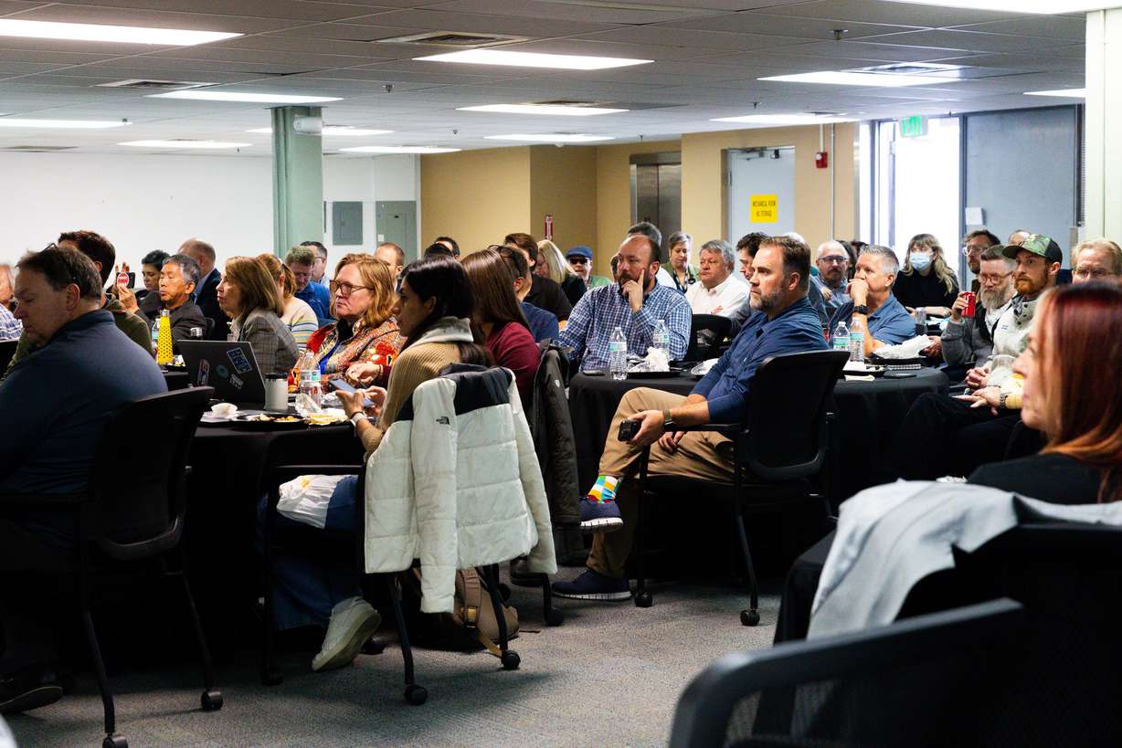 Attendees listen to a presentation at an Intercity Passenger Rail Conference at Utah Transit Authority offices in Salt Lake City on Friday.