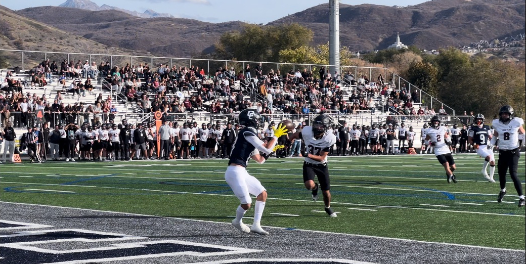 Preston Whatcott catches a touchdown pass for Corner Canyon.
