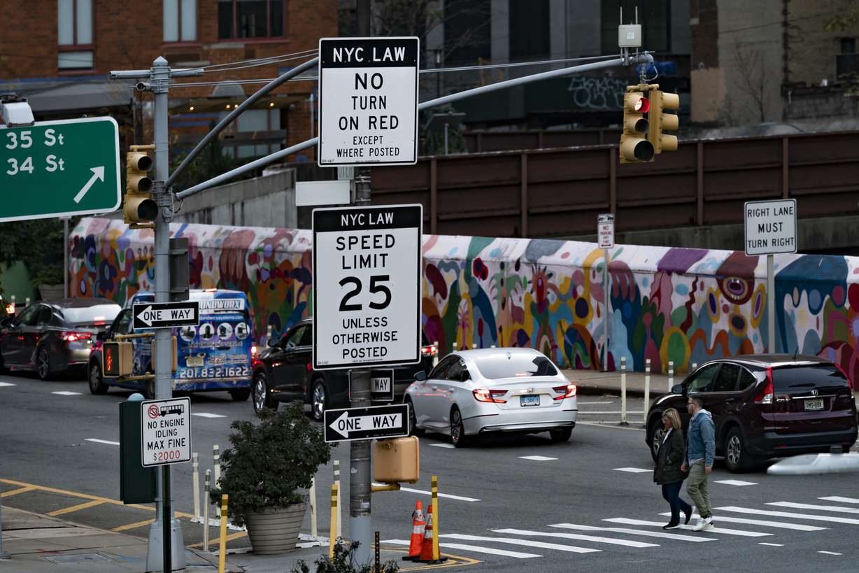 A sign, indicating to drivers that right turns on red are not allowed within city limits, is displayed near the Manhattan exit of the Lincoln Tunnel in New York, Thursday.