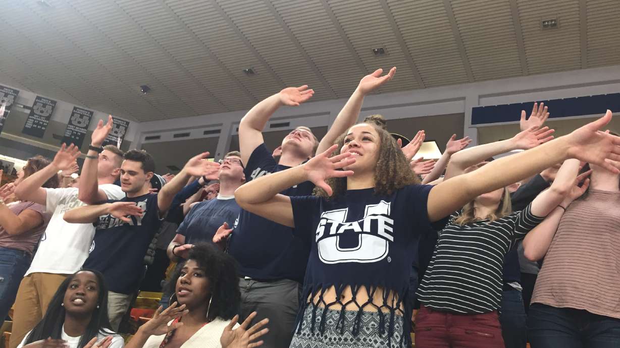 Members of the HURD sing "The Scotsman" at the Dee Glen Smith Spectrum in a game against Wyoming.