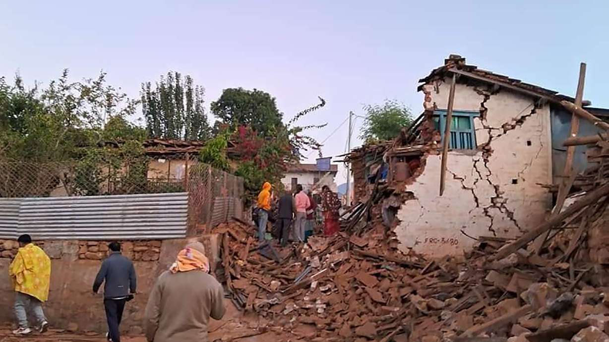Helicopters and ground troops rushed to help people hurt in a strong earthquake that shook northwestern Nepal districts just before midnight Friday, killing more than 100 people and injuring dozens more, officials said Saturday.