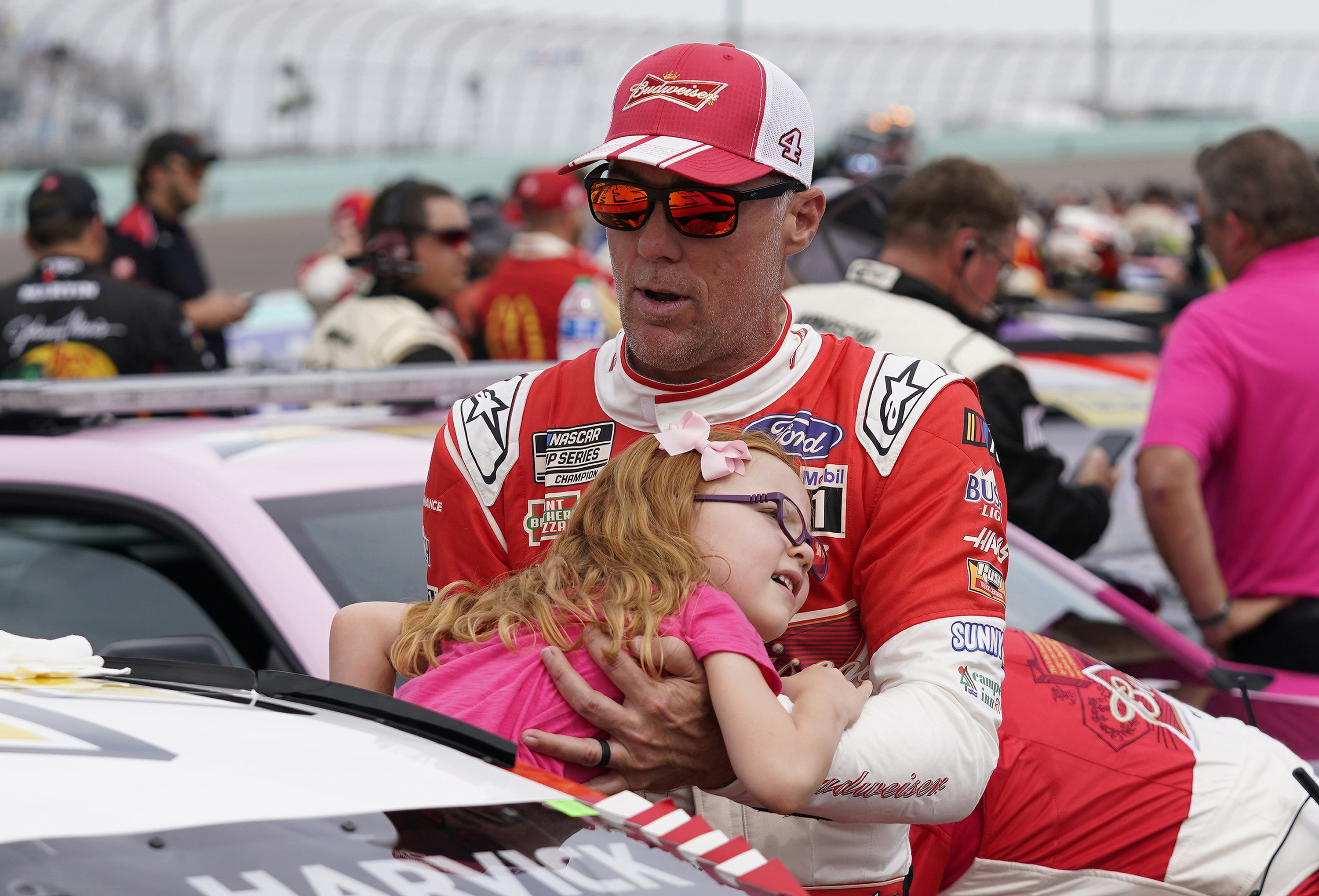 Kevin Harvick pulls his daughter Piper from his car before a NASCAR Cup Series auto race at Homestead-Miami Speedway, Sunday, Oct. 22, 2023 in Homestead, Fla. .