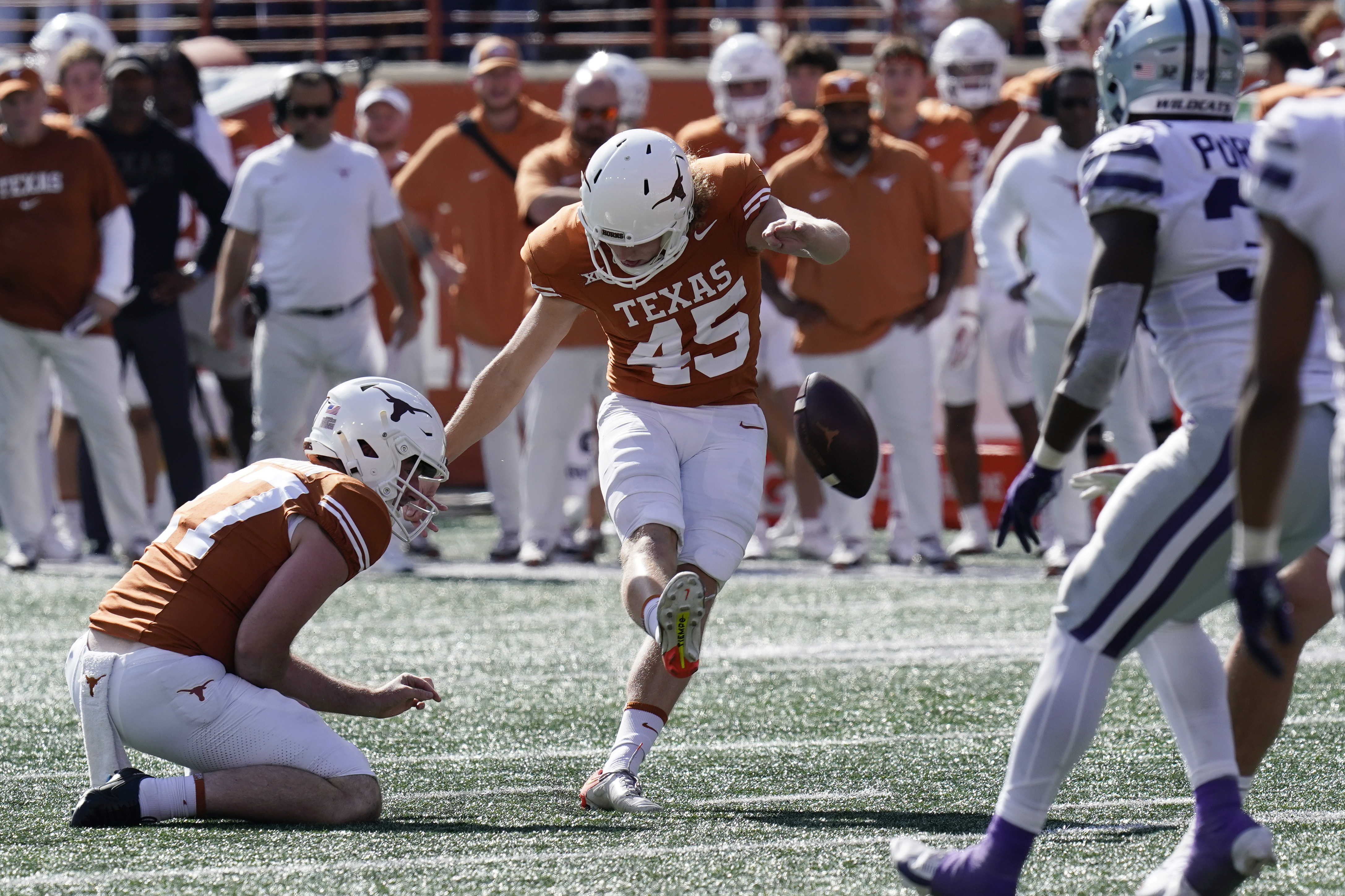 Texas place-kicker Bert Auburn (45) kicks a field goal against Kansas State during in overtime of an NCAA college football game in Austin, Texas, Saturday, Nov. 4, 2023. 