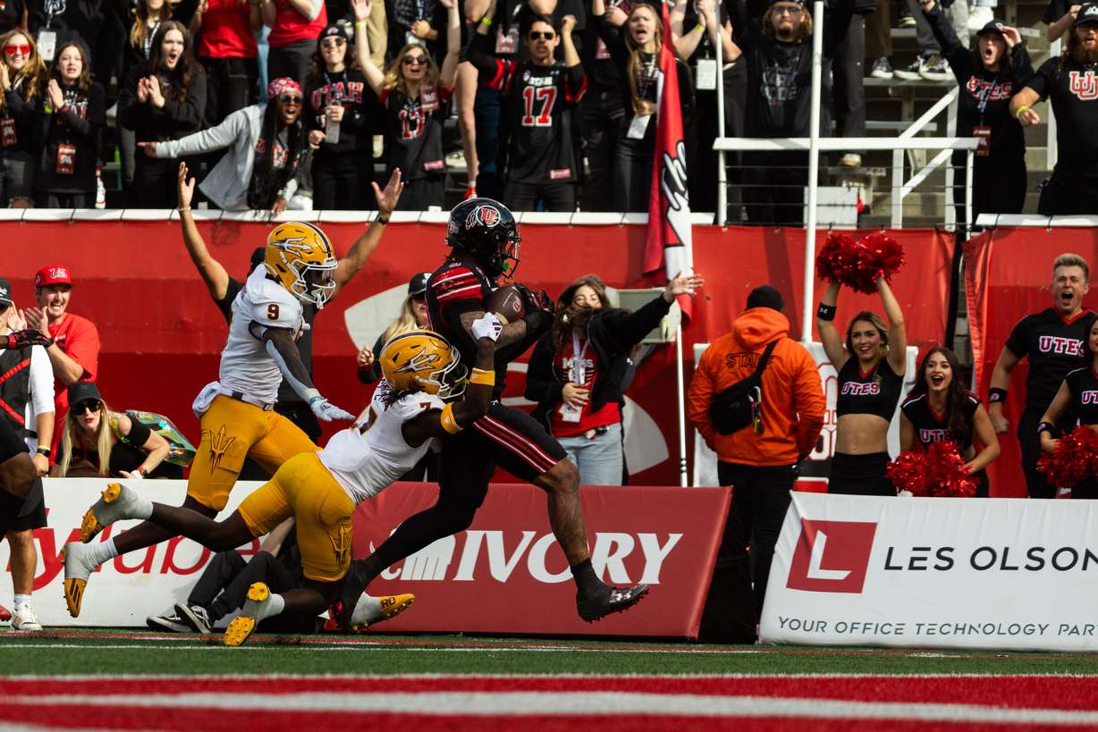 Utah Utes running back Ja'Quinden Jackson runs the ball for a touchdown during the game against the Arizona State Sun Devils at Rice-Eccles Stadium in Salt Lake City on Saturday, Nov. 4, 2023.