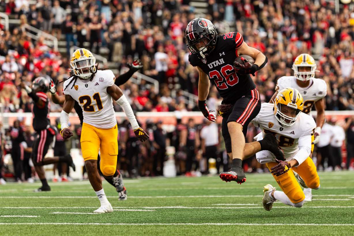 Utah Utes running back Charlie Vincent runs the ball for a touchdown during the game against the Arizona State Sun Devils at Rice-Eccles Stadium in Salt Lake City on Saturday, Nov. 4, 2023.