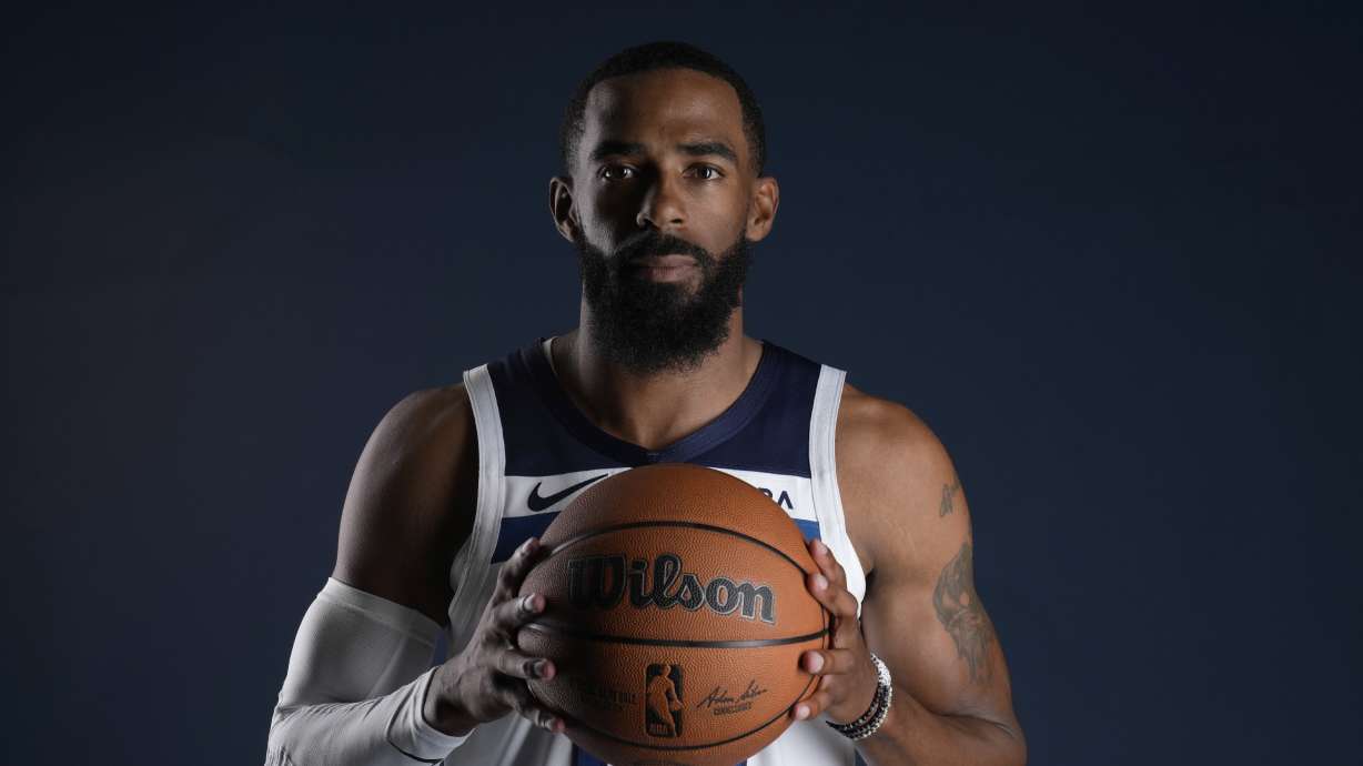 Minnesota Timberwolves guard Mike Conley (10) poses for a photo during the NBA basketball team's media day, Thursday, Sept. 28, 2023, in Minneapolis.