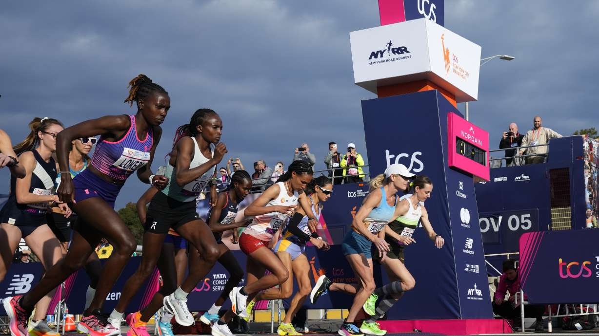 Women's elite division runners make their way onto the Verrazano Narrows Bridge at the start of the New York City Marathon, Sunday, Nov. 5, 2023, in New York.