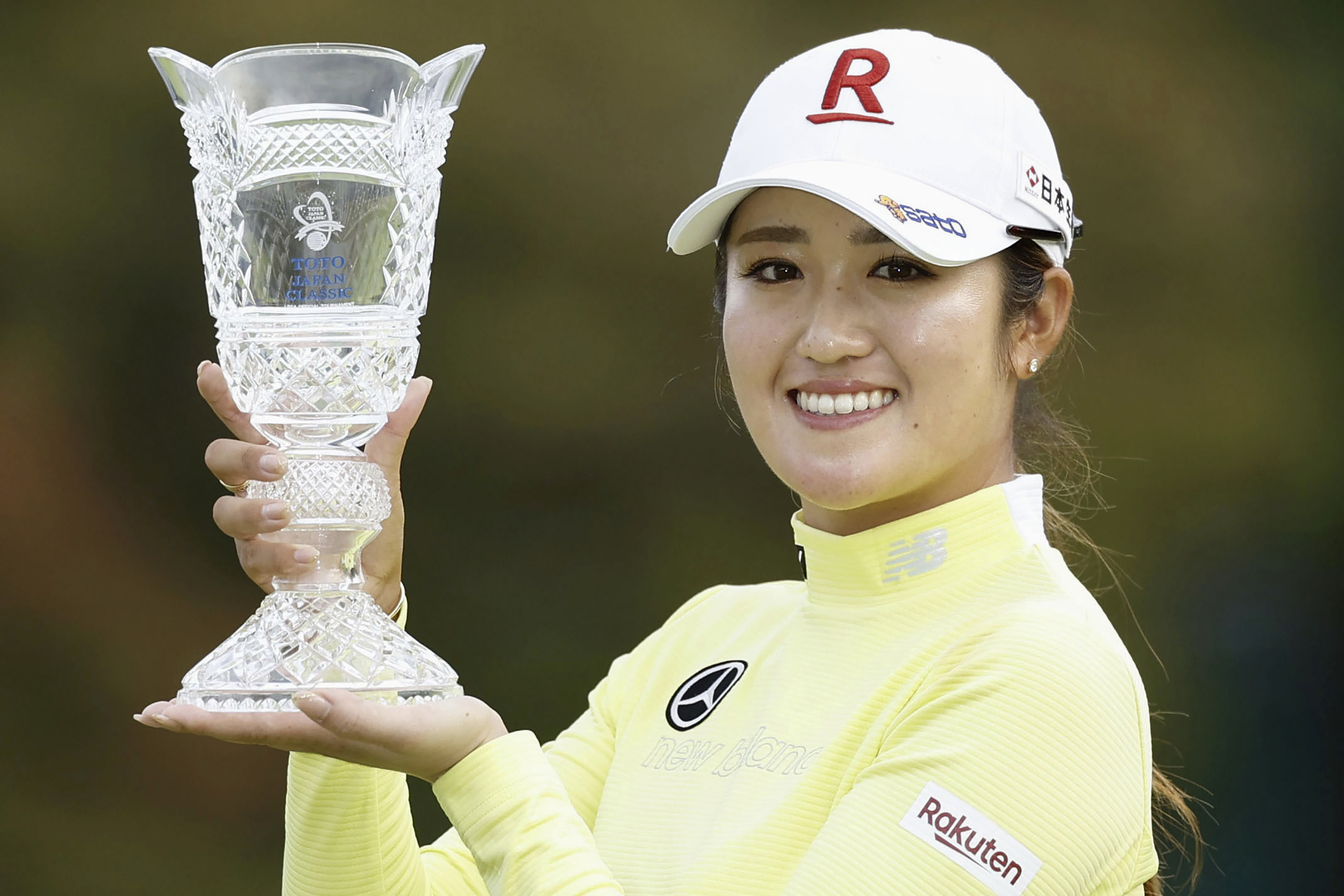 Japanese golfer Mone Inami holds the trophy after winning the LPGA's Japan Classic on Sunday, Nov. 5, 2023, at the Taiheiyo Club in Omitama city, Ibaraki prefecture, north central Japan.
