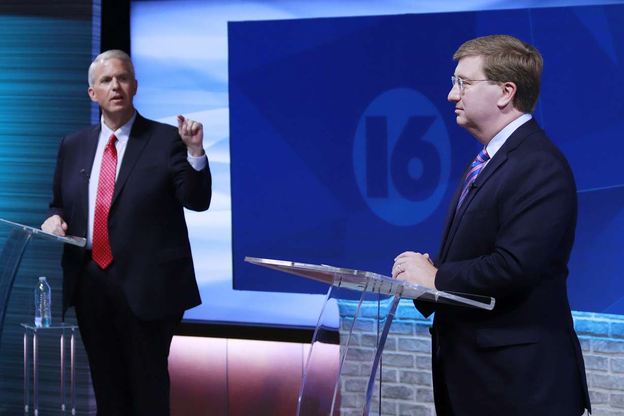 Brandon Presley, the Democratic nominee for governor, left, debates with Republican Mississippi Gov. Tate Reeves during a televised gubernatorial debate Nov. 1, in Jackson, Miss.