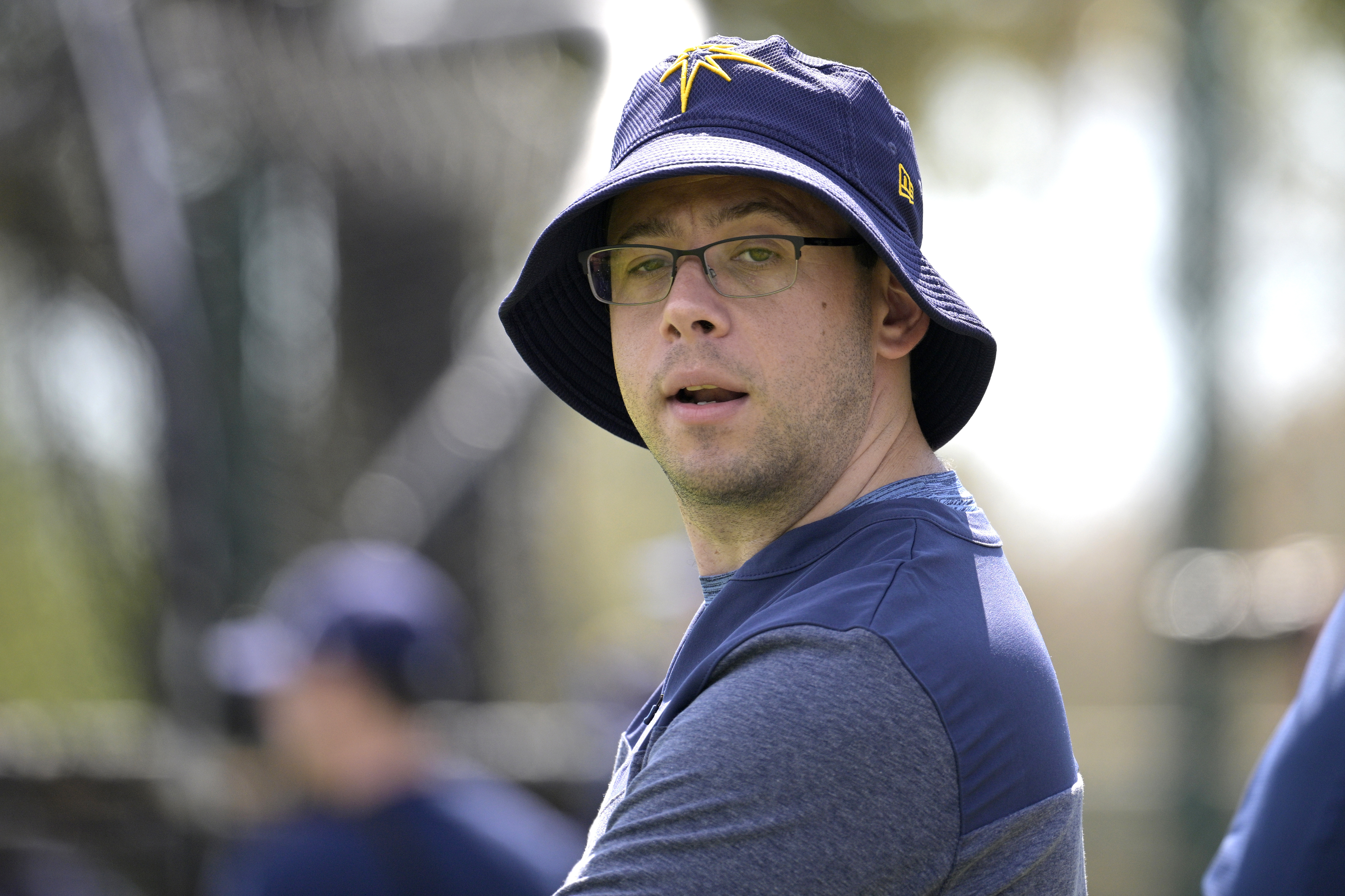 FILE - Tampa Bay Rays general manager Peter Bendix watches during practice at spring training baseball camp, Monday, Feb. 20, 2023, in Kissimmee, Fla. The Miami Marlins are hiring Tampa Bay general manager Peter Bendix to head their baseball operations department, a person with knowledge of the decision said Sunday night, Nov. 5.