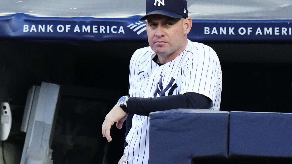 FILE - New York Yankees bench coach Carlos Mendoza watches the first inning of a baseball game against the San Diego Padres, Friday, May 26, 2023, in New York. The New York Mets are hiring Yankees bench coach Carlos Mendoza as their manager, according to a person familiar with the decision. The person spoke to The Associated Press on condition of anonymity Monday, Nov. 6, because the move had not been announced.