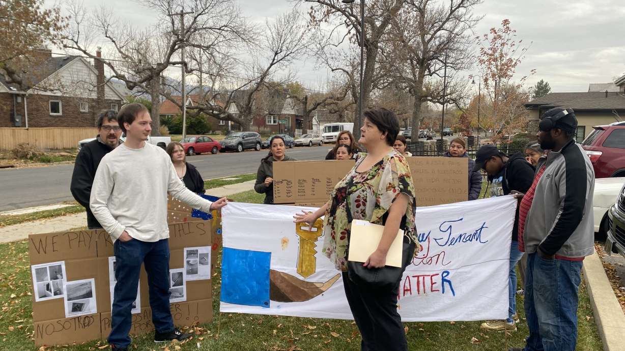 Tenants deliver a set of demands to the Housing Authority of Salt Lake City on Monday.