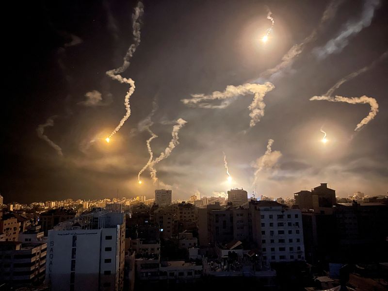 Flares are dropped by Israeli forces, amid the ongoing conflict between Israel and Palestinian Islamist group Hamas, in Gaza Monday