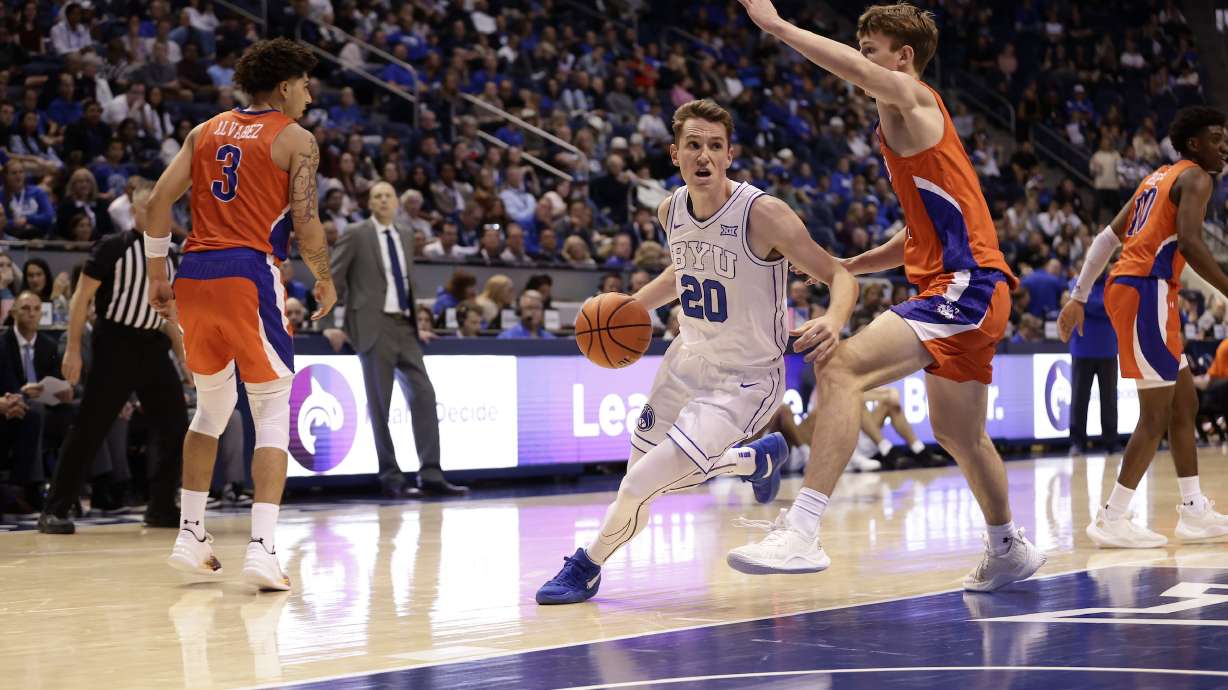 BYU wing Spencer Johnson to the rim against Houston Christian in an NCAA men's basketball game, Monday, Nov. 6, 2023, at the Marriott Center in Provo.