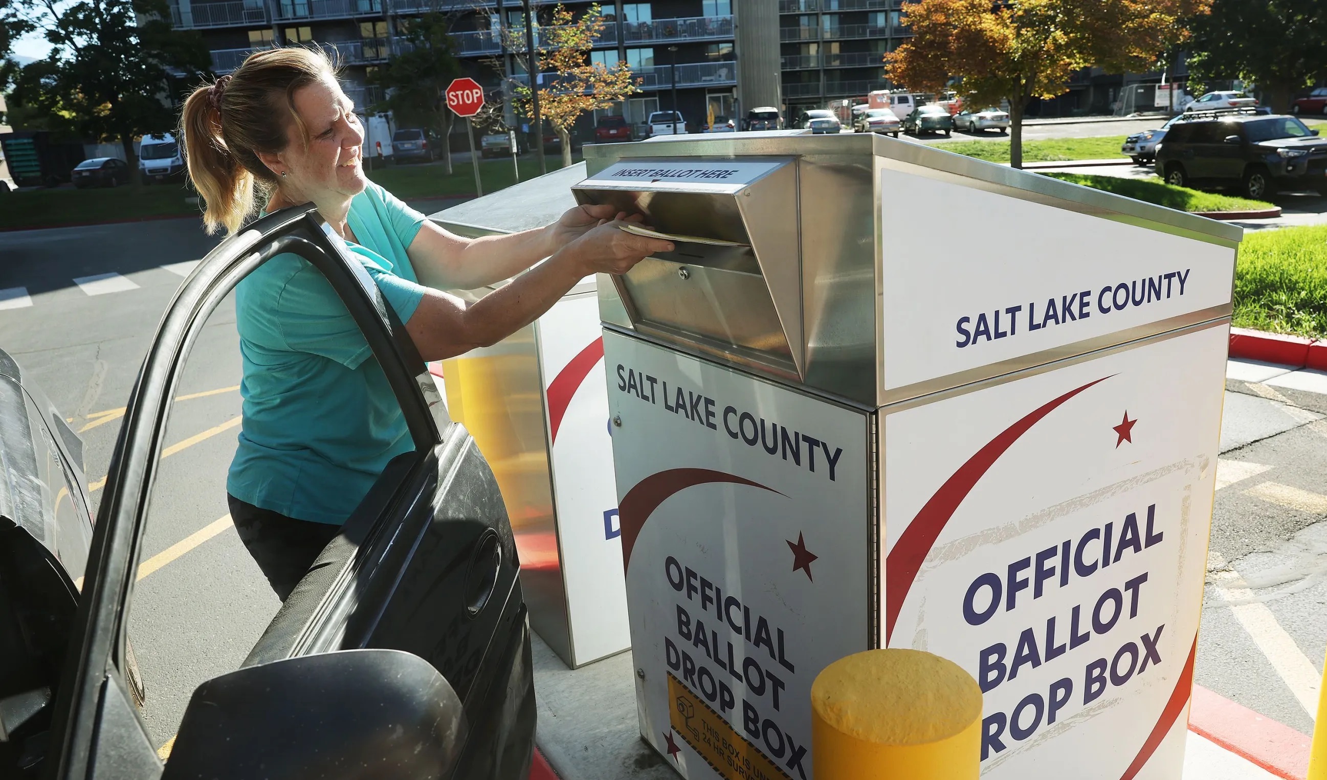 Tracy Ashcraft drops off her ballot during Utah’s municipal and primary elections at the Salt Lake County Government Center in Salt Lake City on Sept. 5. Tuesday is Election Day nationwide — but not in Utah.