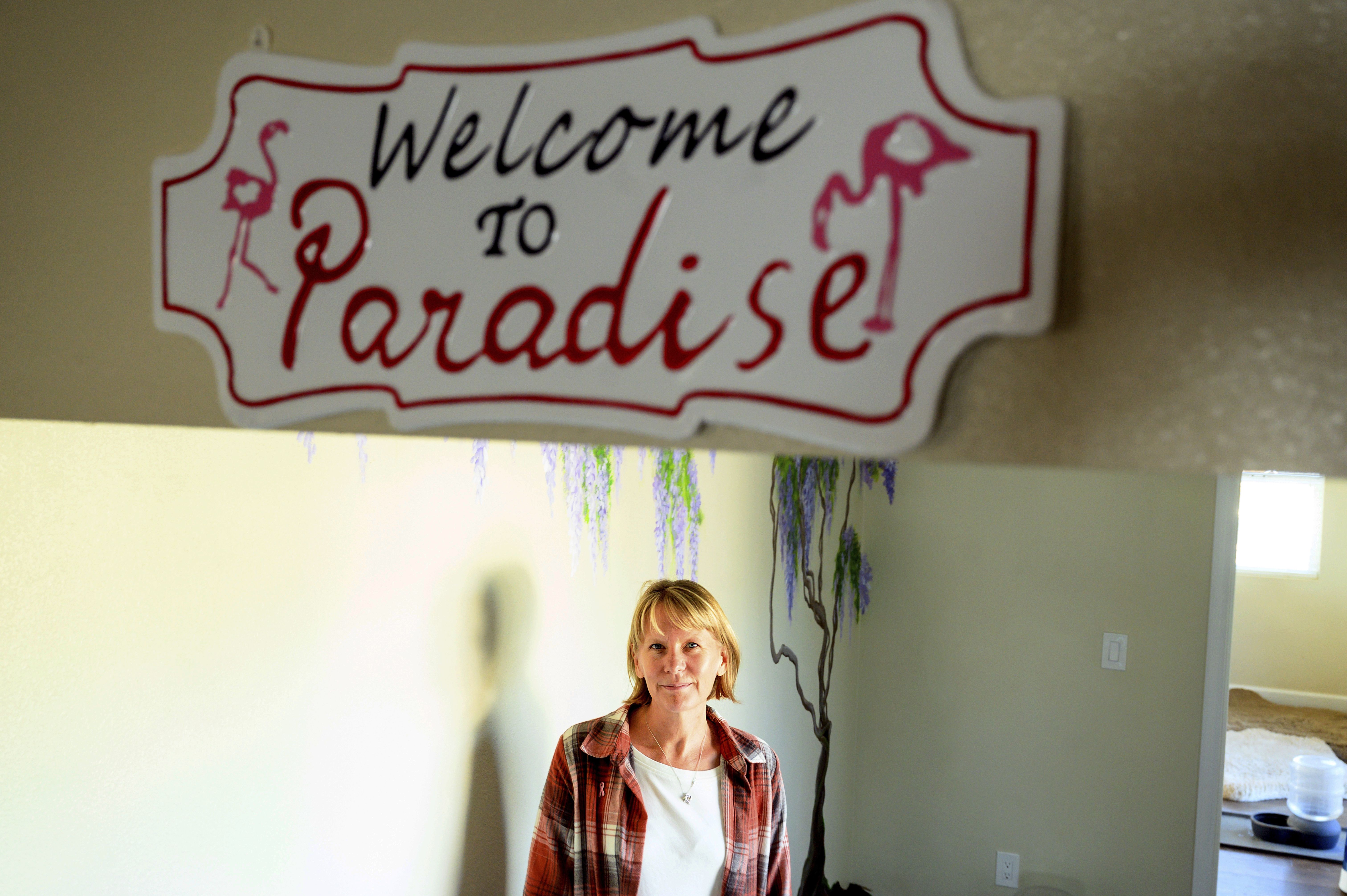 Heidi Lange stands inside her Paradise, Calif., home, Oct. 26. Lange, who rebuilt following the Camp Fire, is facing a homeowners insurance quote that jumped from $1,191 to $9,754. 