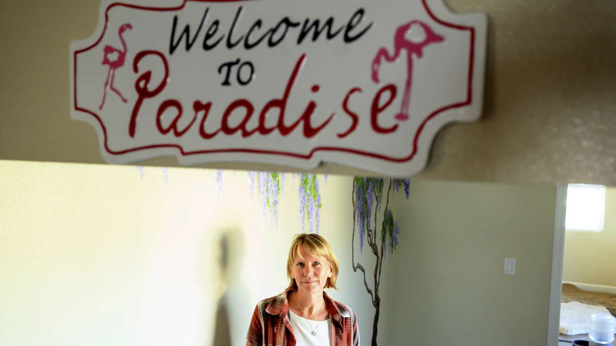 Heidi Lange stands inside her Paradise, Calif., home, Oct. 26. Lange, who rebuilt following the Camp Fire, is facing a homeowners insurance quote that jumped from $1,191 to $9,754.