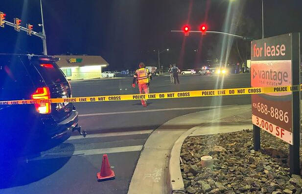 Emergency crews work the scene of a fatal pedestrian-vehicle incident Friday night at the intersection of 500 North and Bluff Street.