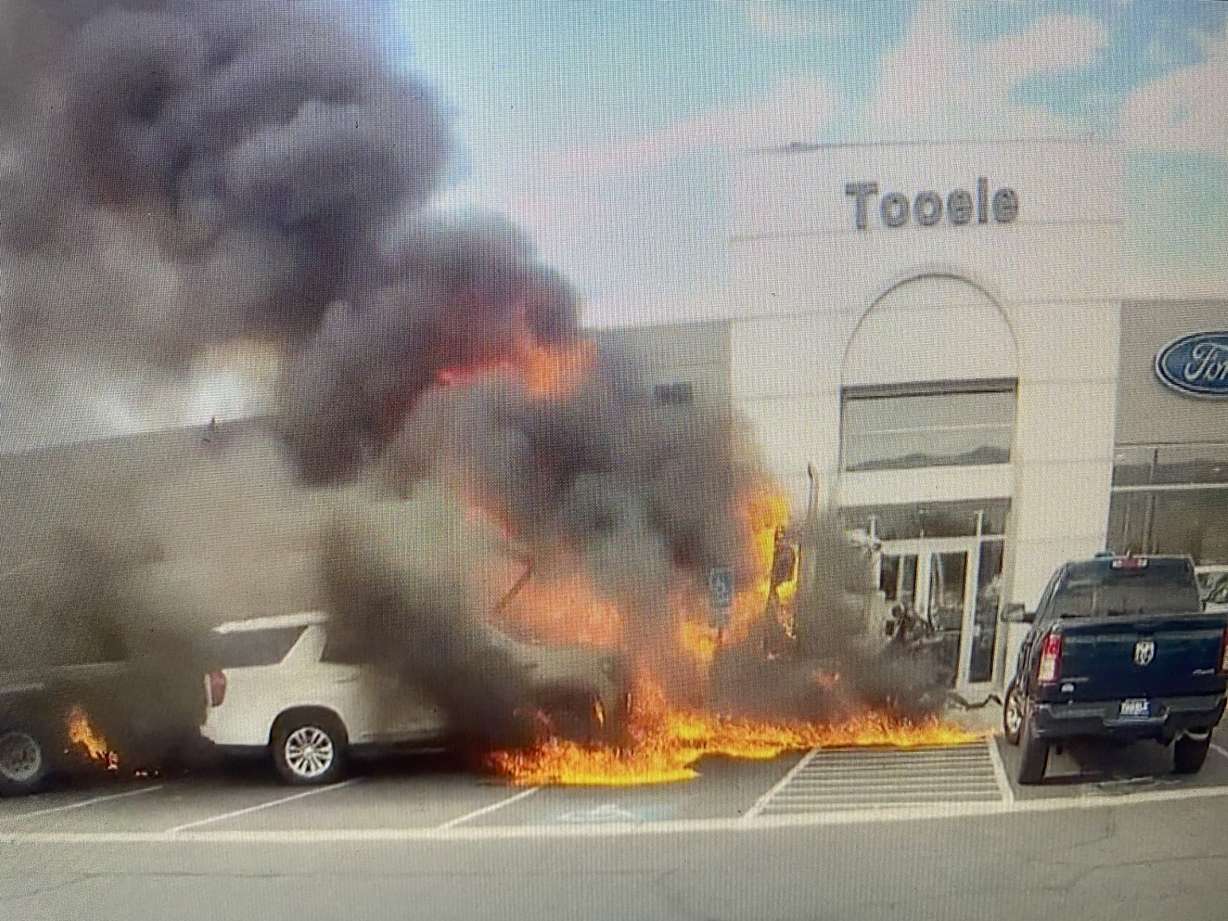 Videos capture an apparent runaway semitruck crashing into vehicles and a car dealership in Tooele Friday.
