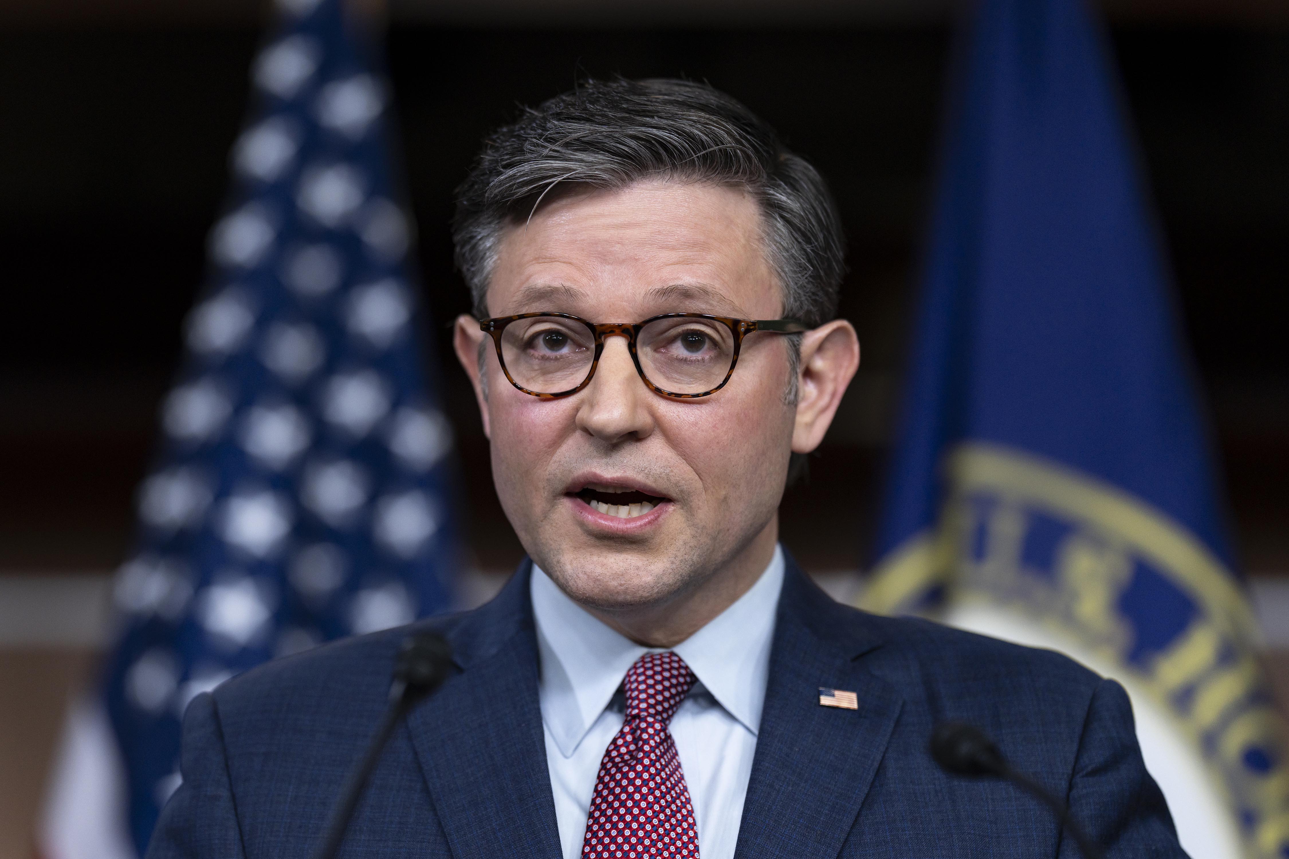 Speaker of the House Mike Johnson, R-La., talks with reporters ahead of the debate and vote on supplemental aid to Israel, at the Capitol in Washington, Nov. 2.