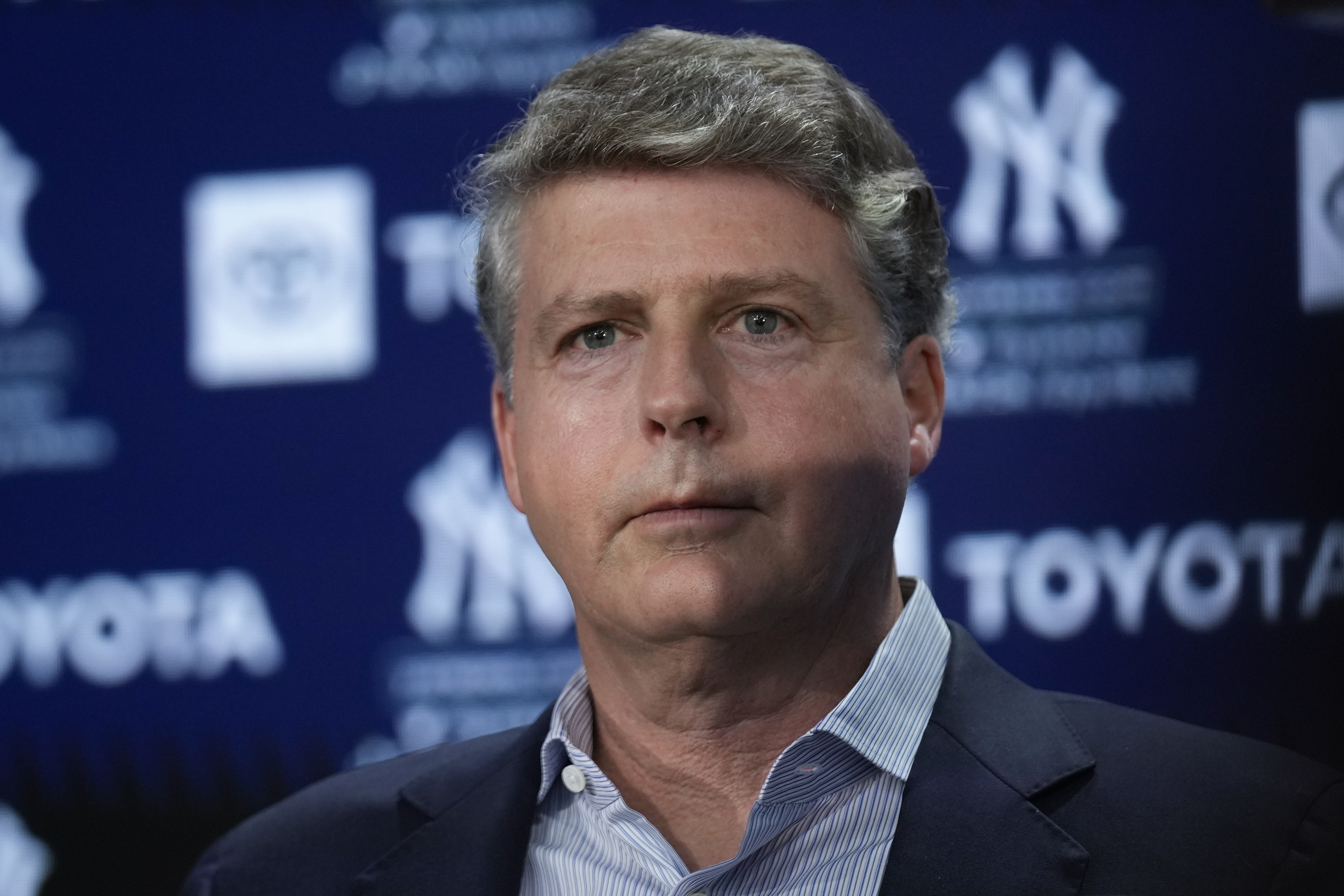 FILE - New York Yankees' owner Hal Steinbrenner attends a news conference at Yankee Stadium, Wednesday, Dec. 21, 2022, in New York. Hal Steinbrenner questioned current and former players along with staff on whether to keep Aaron Boone before deciding the New York manager will return next year. “We had a winning season. ... That's not an accomplishment, that's a requirement,” Steinbrenner said Tuesday, Nov. 7, 2023, during an online news conference. 
