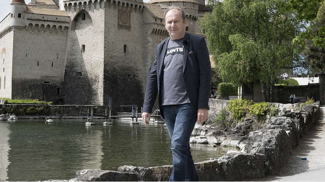 Marc Gauthier, a Parkinson’s patient, is pictured in this press release photograph from Lausanne University Hospital, discussing Gauthier’s spinal cord implant that is allowing him to walk safely.